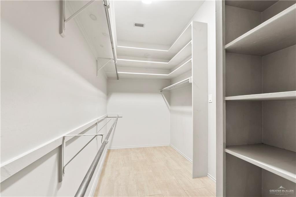 814 Rio Grande Drive Mission, TX 78572 - Photo 14 of 29 a view of staircase with railing and white walls