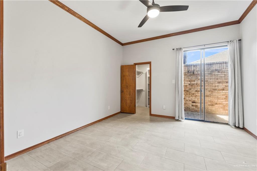 814 Rio Grande Drive Mission, TX 78572 - Photo 16 of 29 an empty room with windows