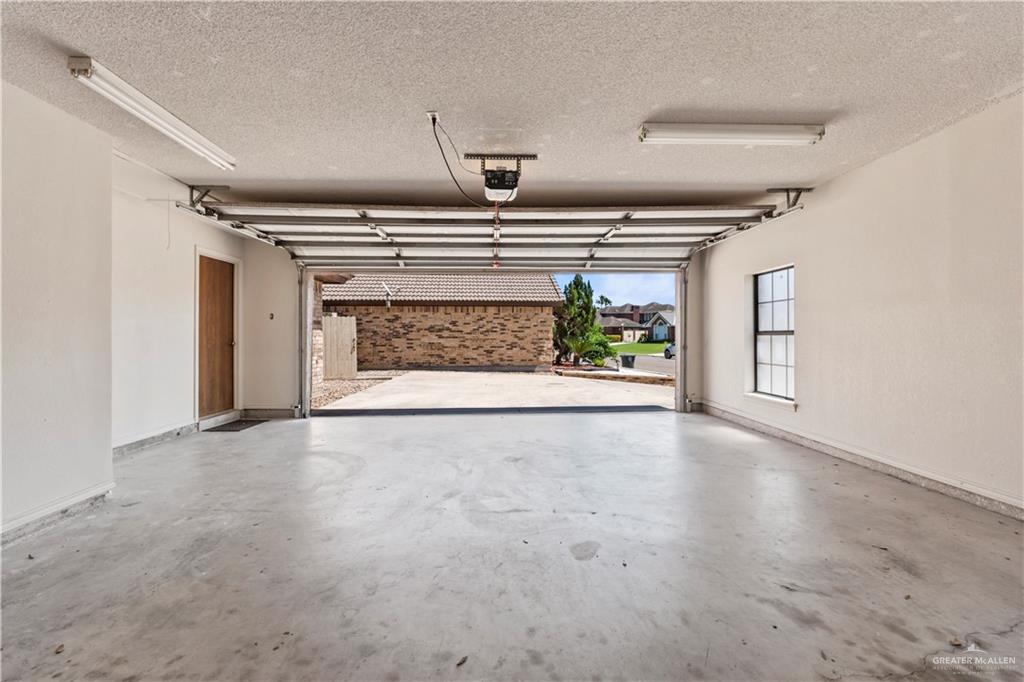 814 Rio Grande Drive Mission, TX 78572 - Photo 22 of 29 a view of an empty room and a fireplace