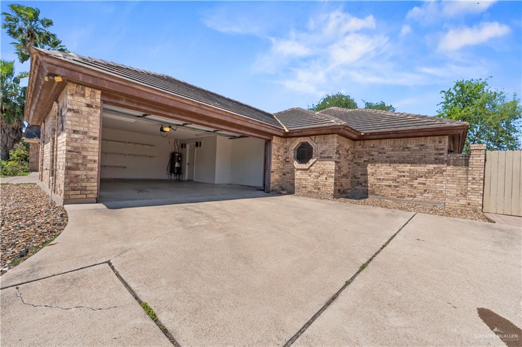 814 Rio Grande Drive Mission, TX 78572 - Photo 23 of 29 a view of a house with a garage