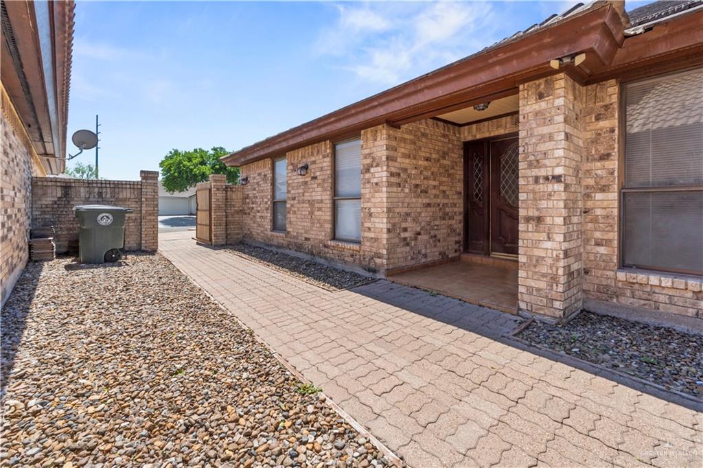 814 Rio Grande Drive Mission, TX 78572 - Photo 25 of 29 a front view of a house with a yard