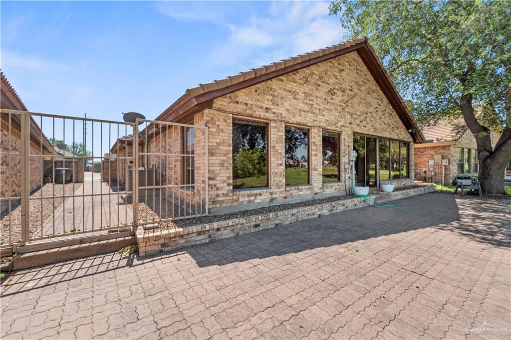 814 Rio Grande Drive Mission, TX 78572 - Photo 26 of 29 a view of a house with backyard and porch