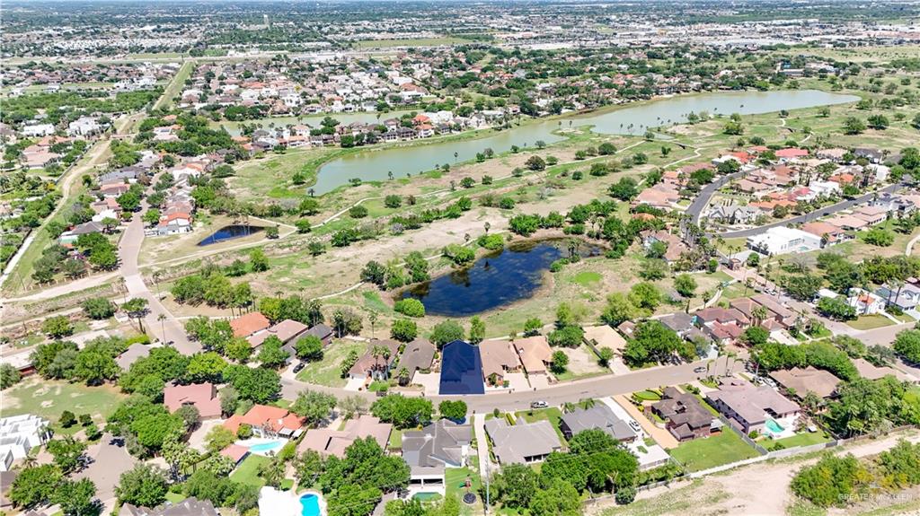 814 Rio Grande Drive Mission, TX 78572 - Photo 29 of 29 an aerial view of residential houses with outdoor space and covered with green space