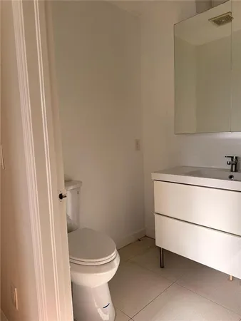 a bathroom with a sink and a toilet