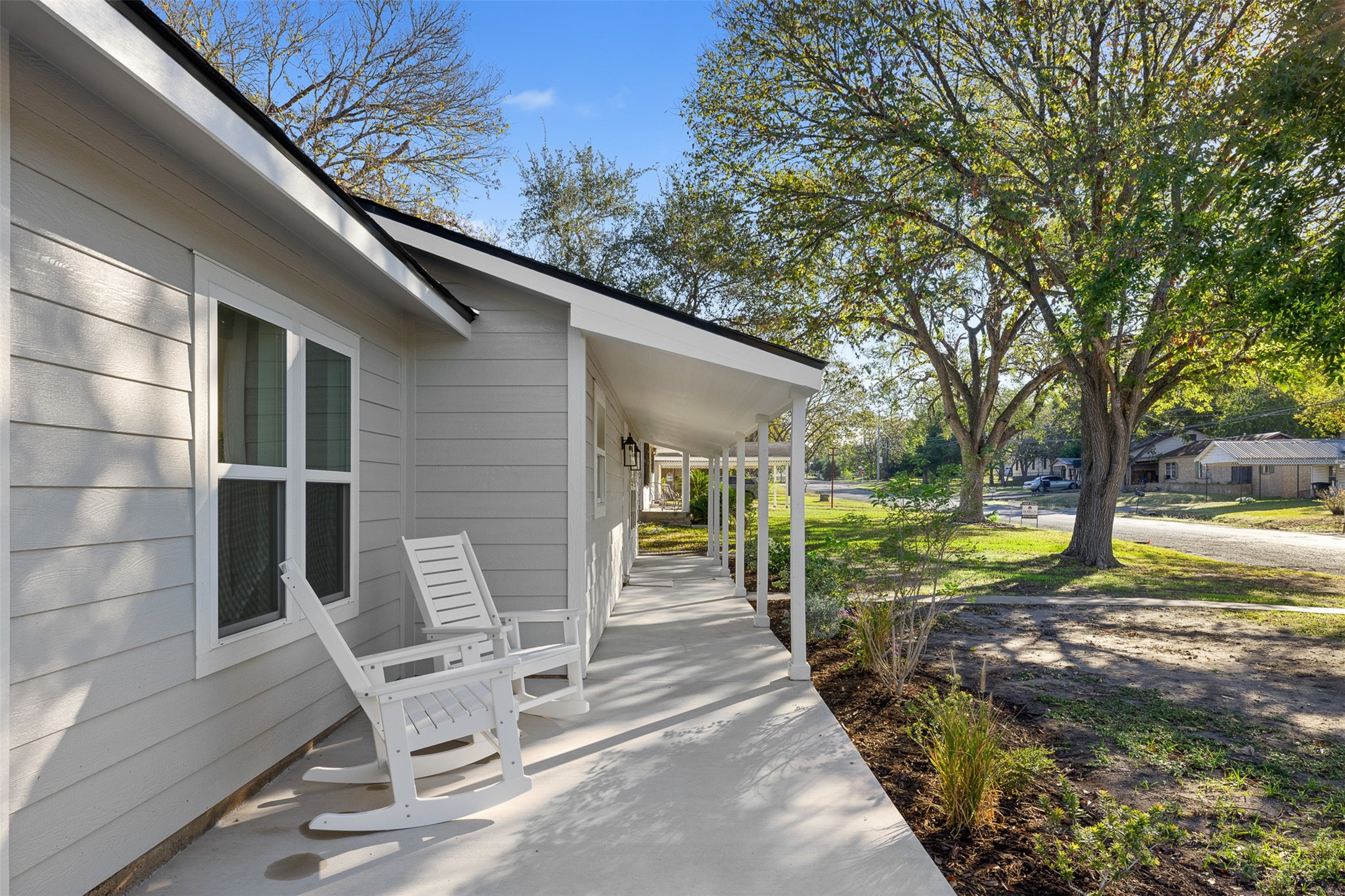 911 Eilers Street Schulenburg, TX 78956 - Photo 4 of 22 a view of a chair and tables in the patio of the house