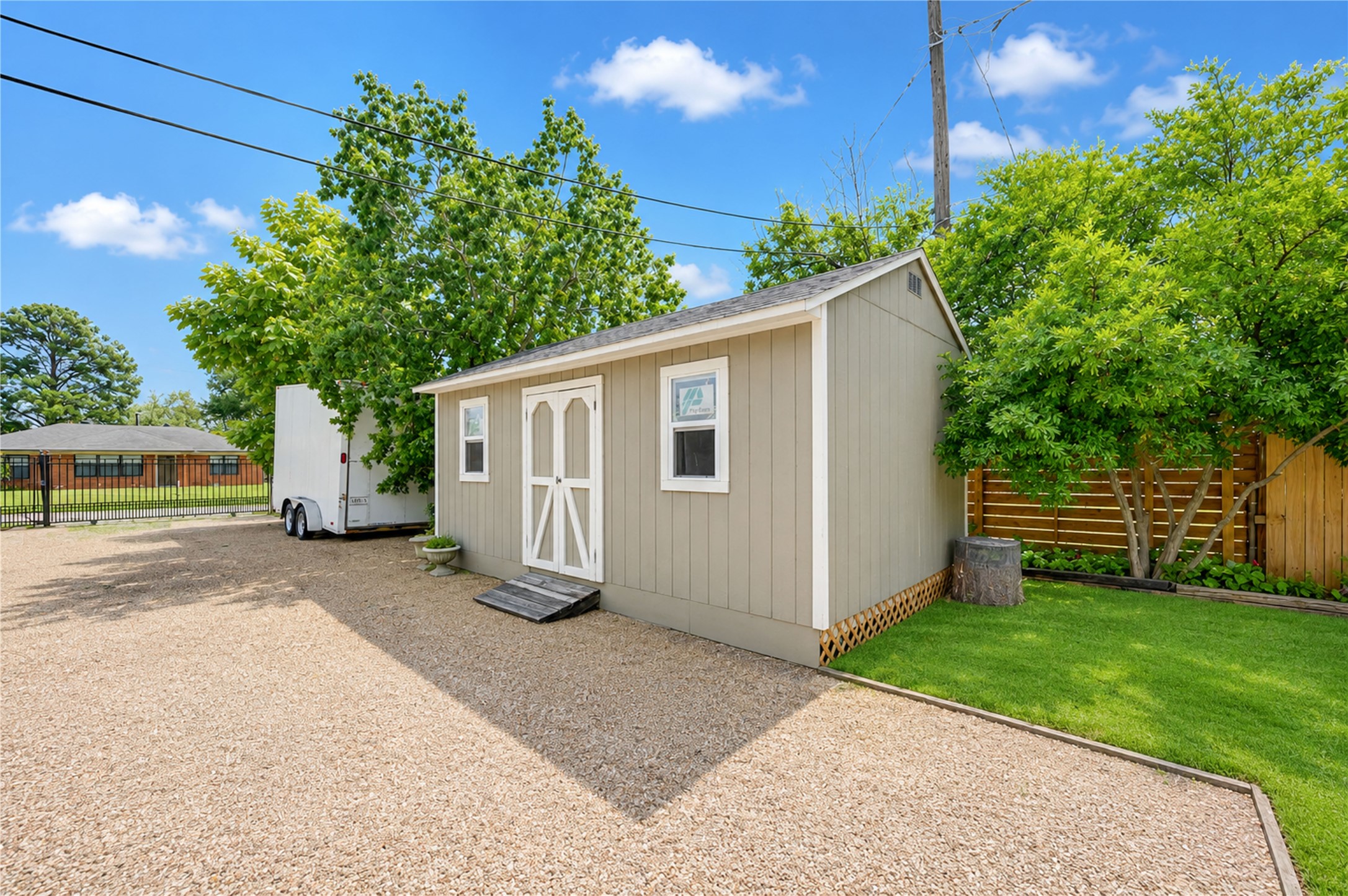 4018 Blalock Road Houston, TX 77080 - Photo 31 of 35 Include a backyard storage shed seamlessly matched to the home's exterior colors-a highly desirable feature for extra organization.