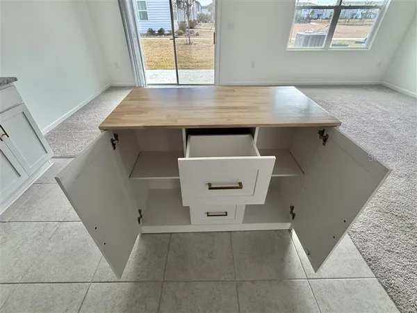a view of kitchen and utility room
