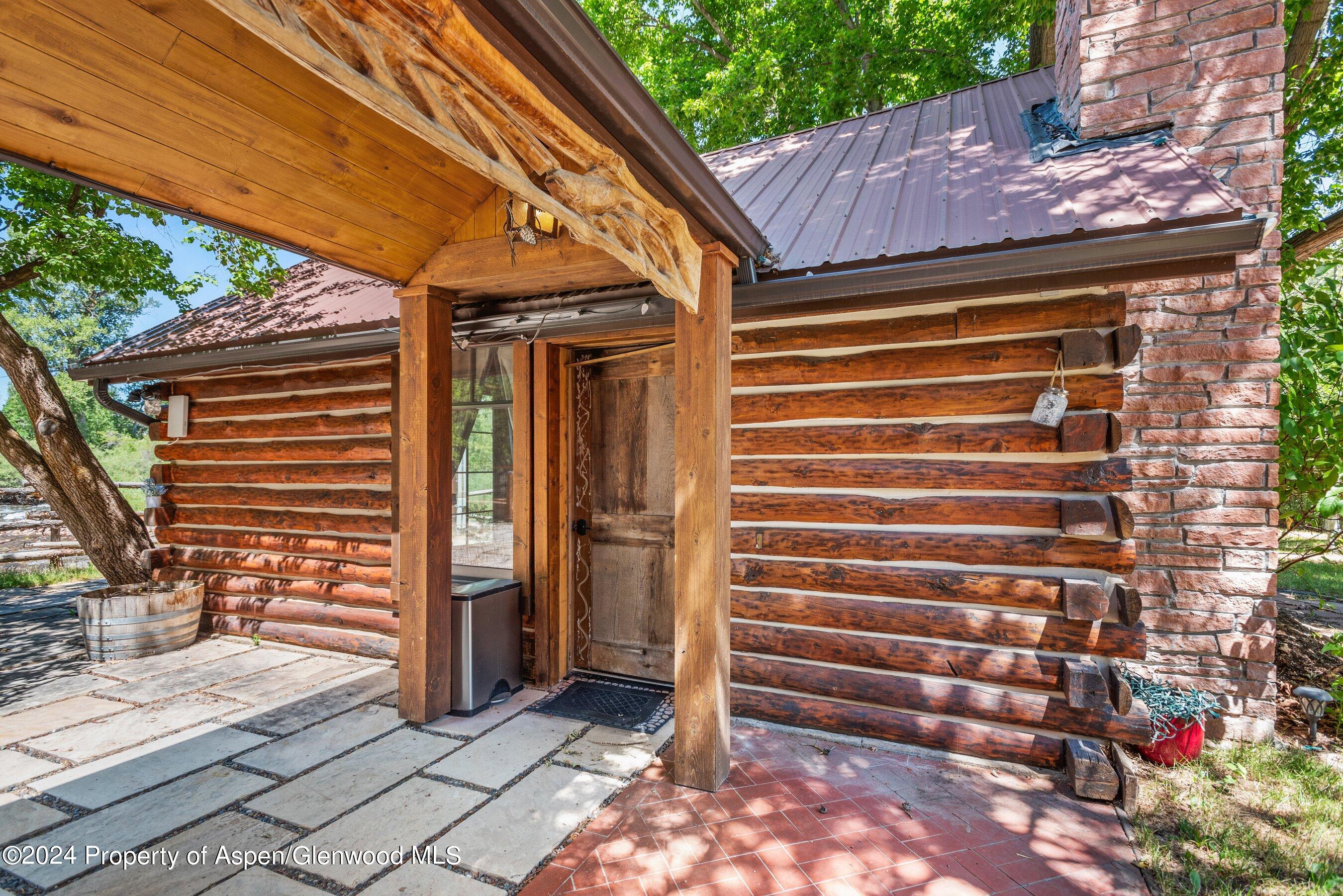 969 Willits Lane Basalt, CO 81621 - Photo 21 of 96 a front view of a house with a garden