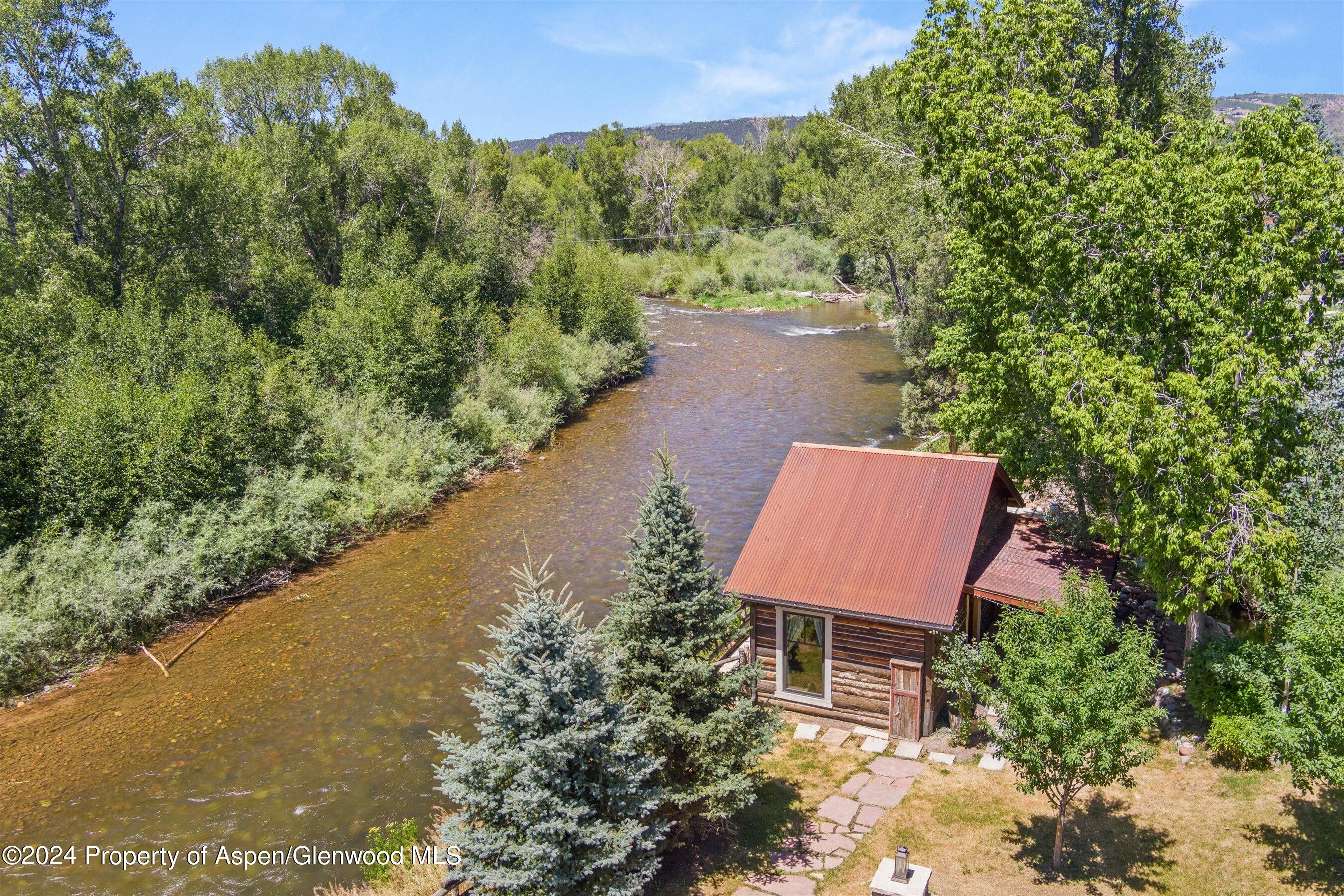969 Willits Lane Basalt, CO 81621 - Photo 46 of 96 an aerial view of a house with a yard and lake view