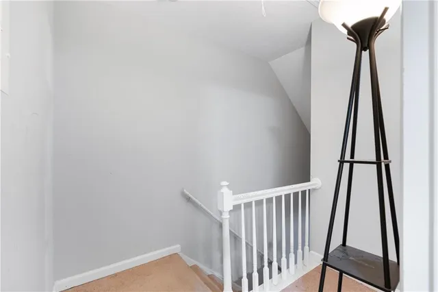 a view of hallway with stairs