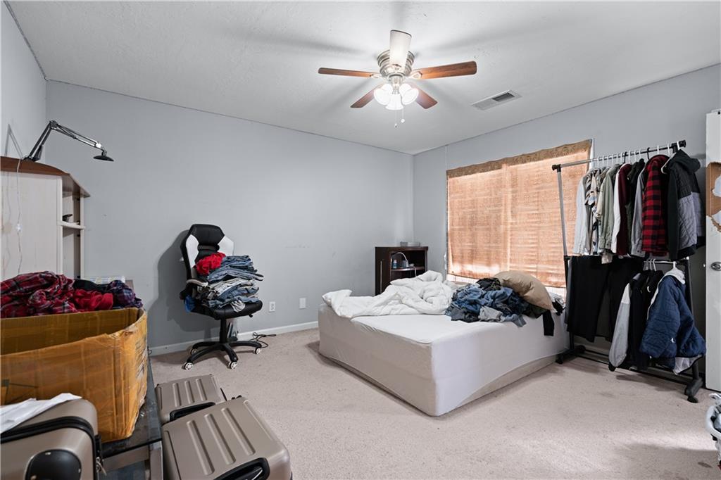 237 Chads Ford Way Roswell, GA 30076 - Photo 14 of 22 a living room with furniture and a flat screen tv