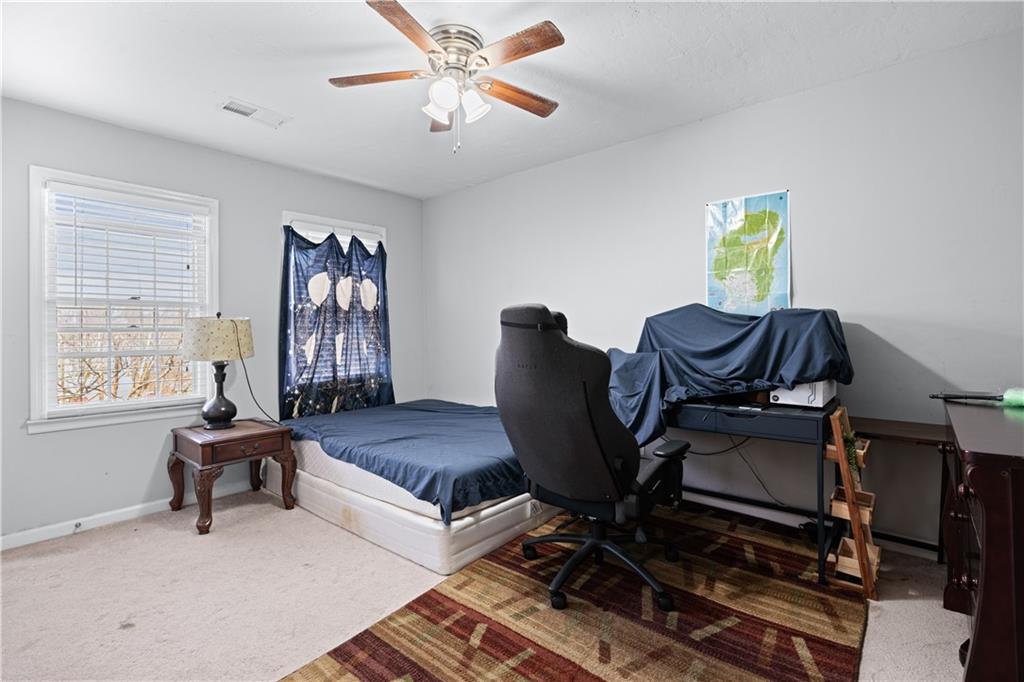 237 Chads Ford Way Roswell, GA 30076 - Photo 18 of 22 a living room with furniture and a window