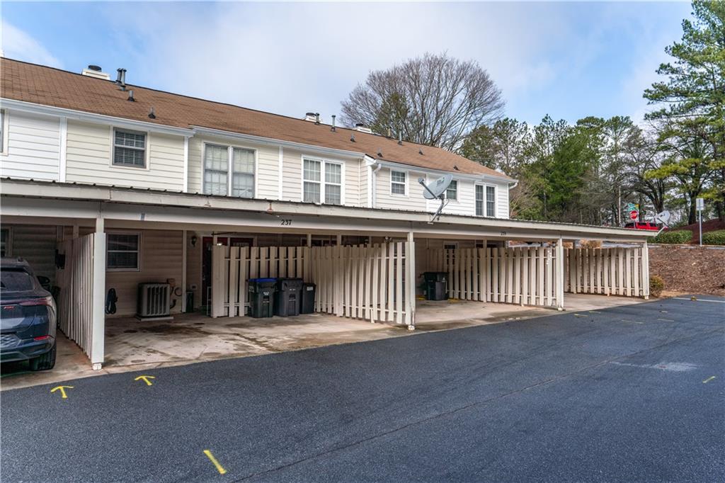 237 Chads Ford Way Roswell, GA 30076 - Photo 22 of 22 a front view of a house with a outdoor space