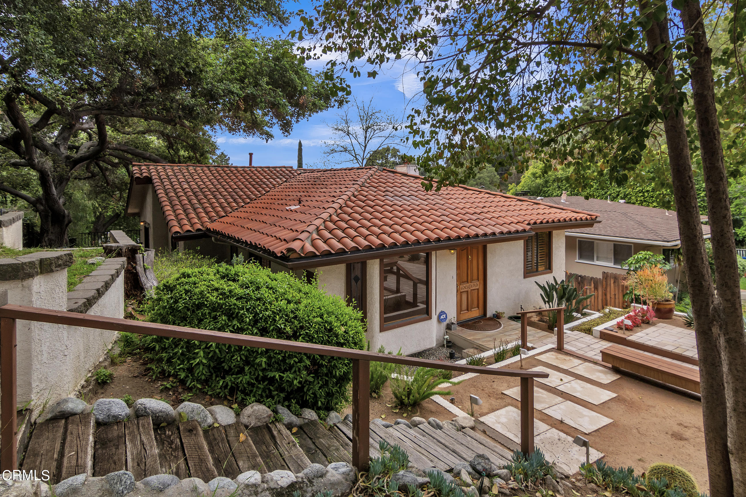 524 Franklin Place Monrovia, CA 91016 - Photo 2 of 33 a view of house with patio outdoor seating and covered with trees