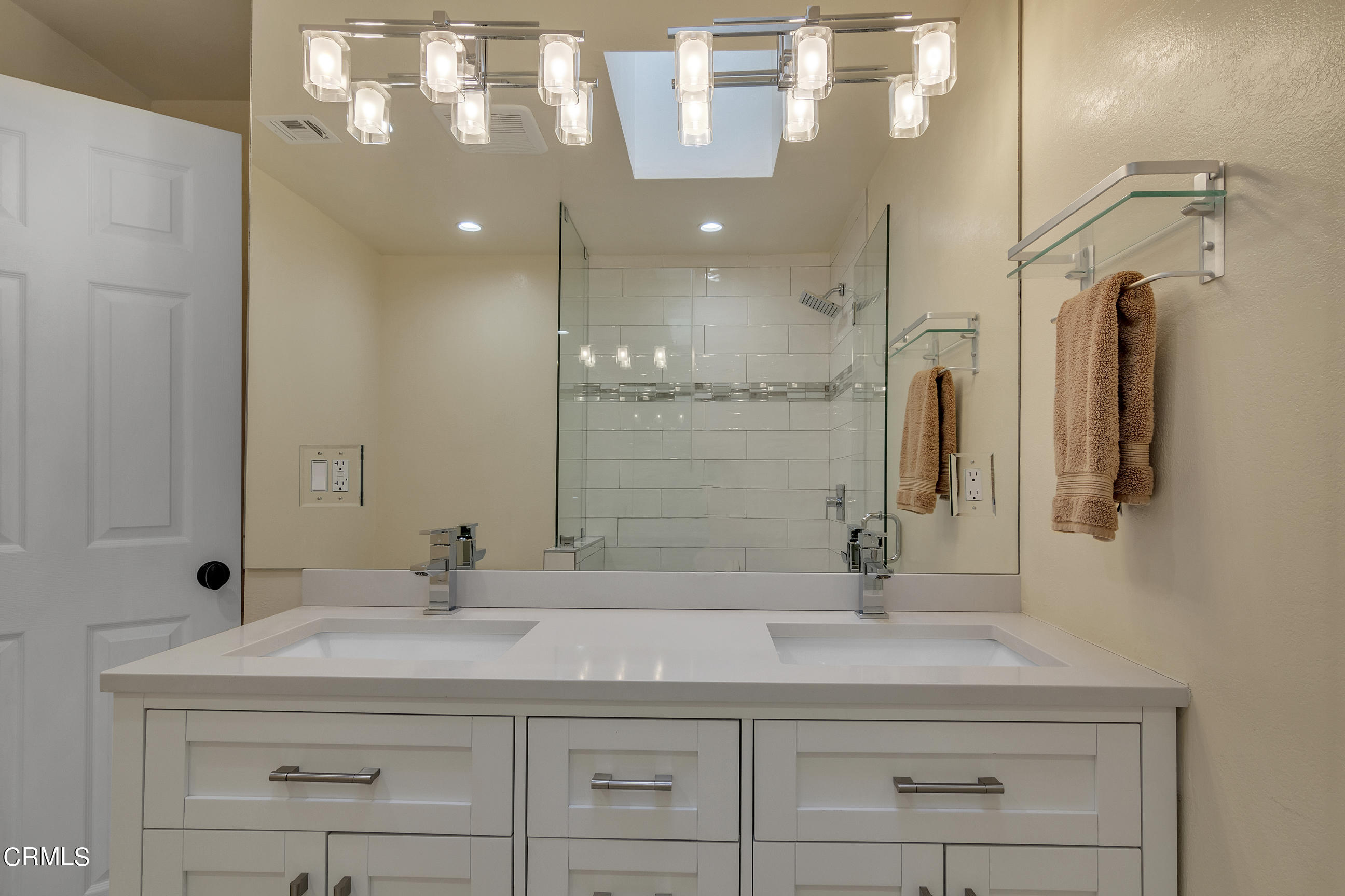524 Franklin Place Monrovia, CA 91016 - Photo 16 of 33 a bathroom with a sink double vanity and a mirror