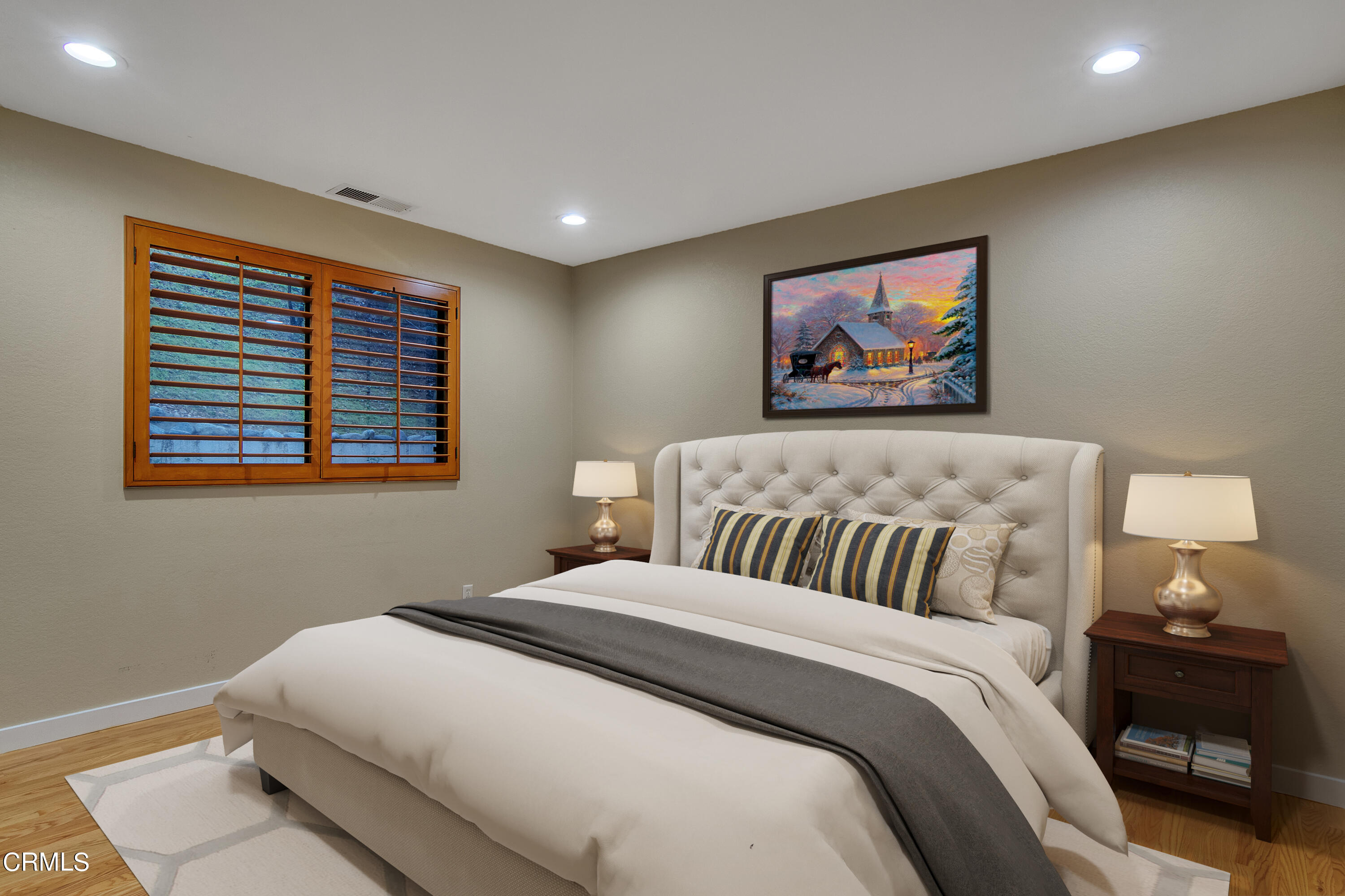 524 Franklin Place Monrovia, CA 91016 - Photo 17 of 33 a bedroom with a bed and a lamp