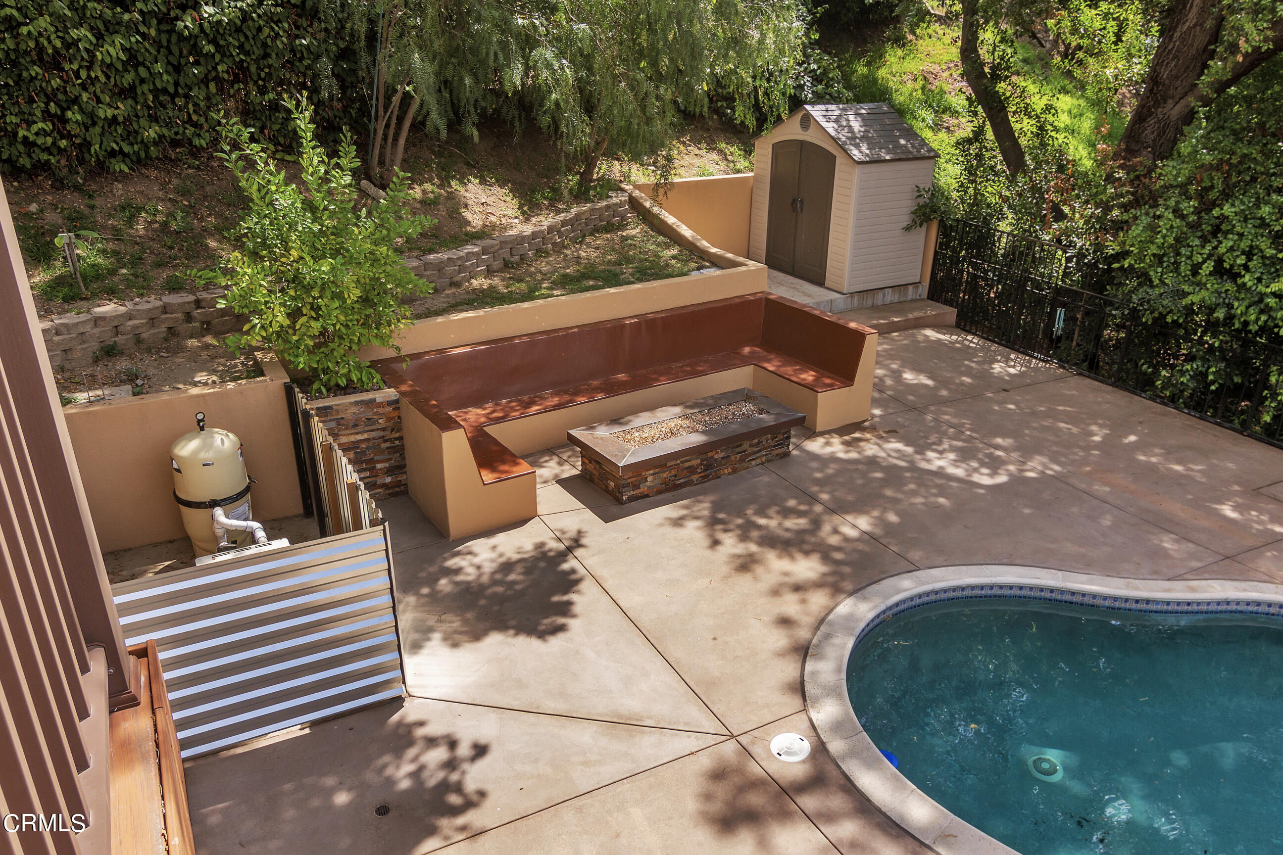 524 Franklin Place Monrovia, CA 91016 - Photo 22 of 33 a view of a wooden door and a fire pit