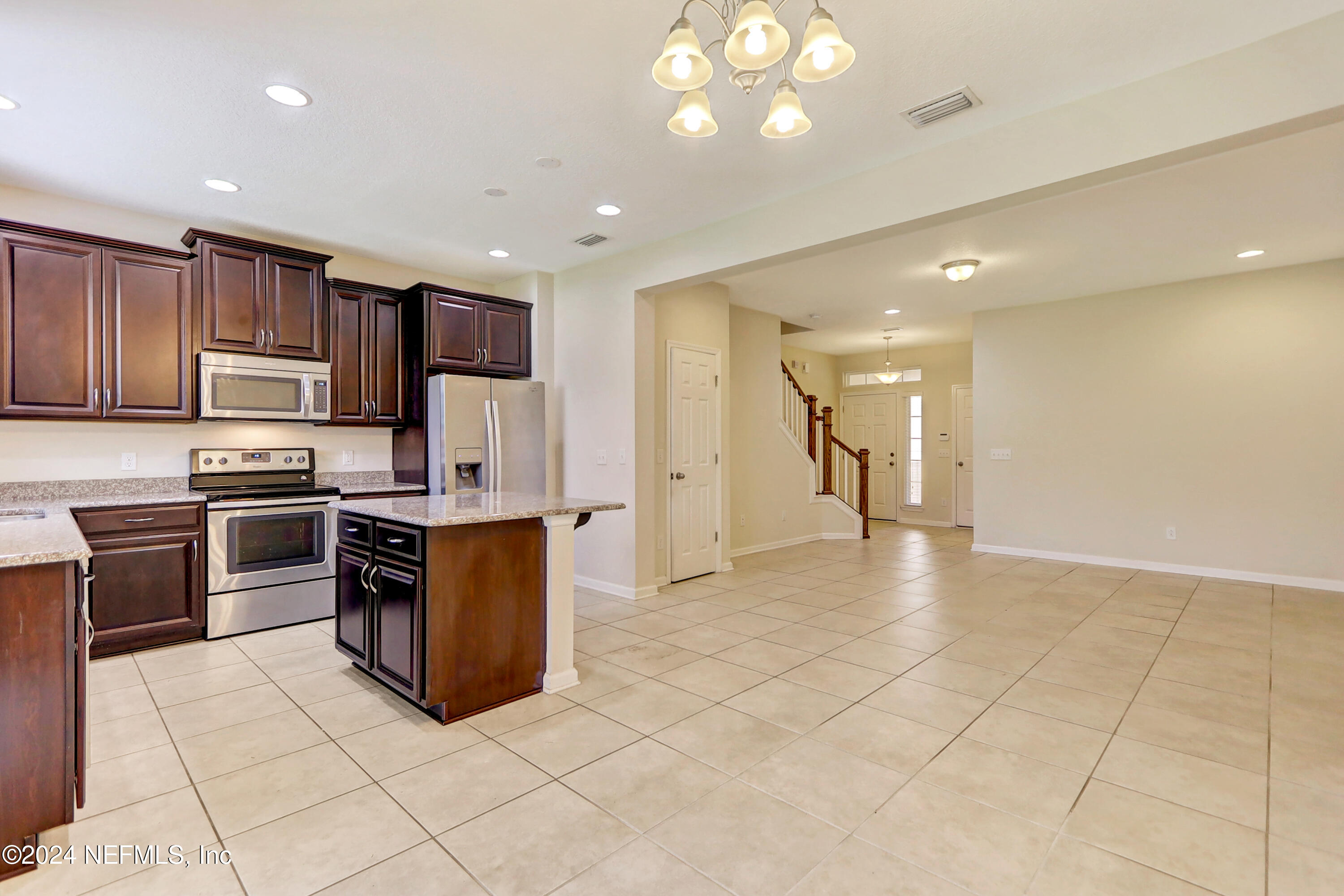 95 Nelson Lane St. Johns, FL 32259 - Photo 14 of 30 a view of kitchen with stainless steel appliances cabinets and a counter top space