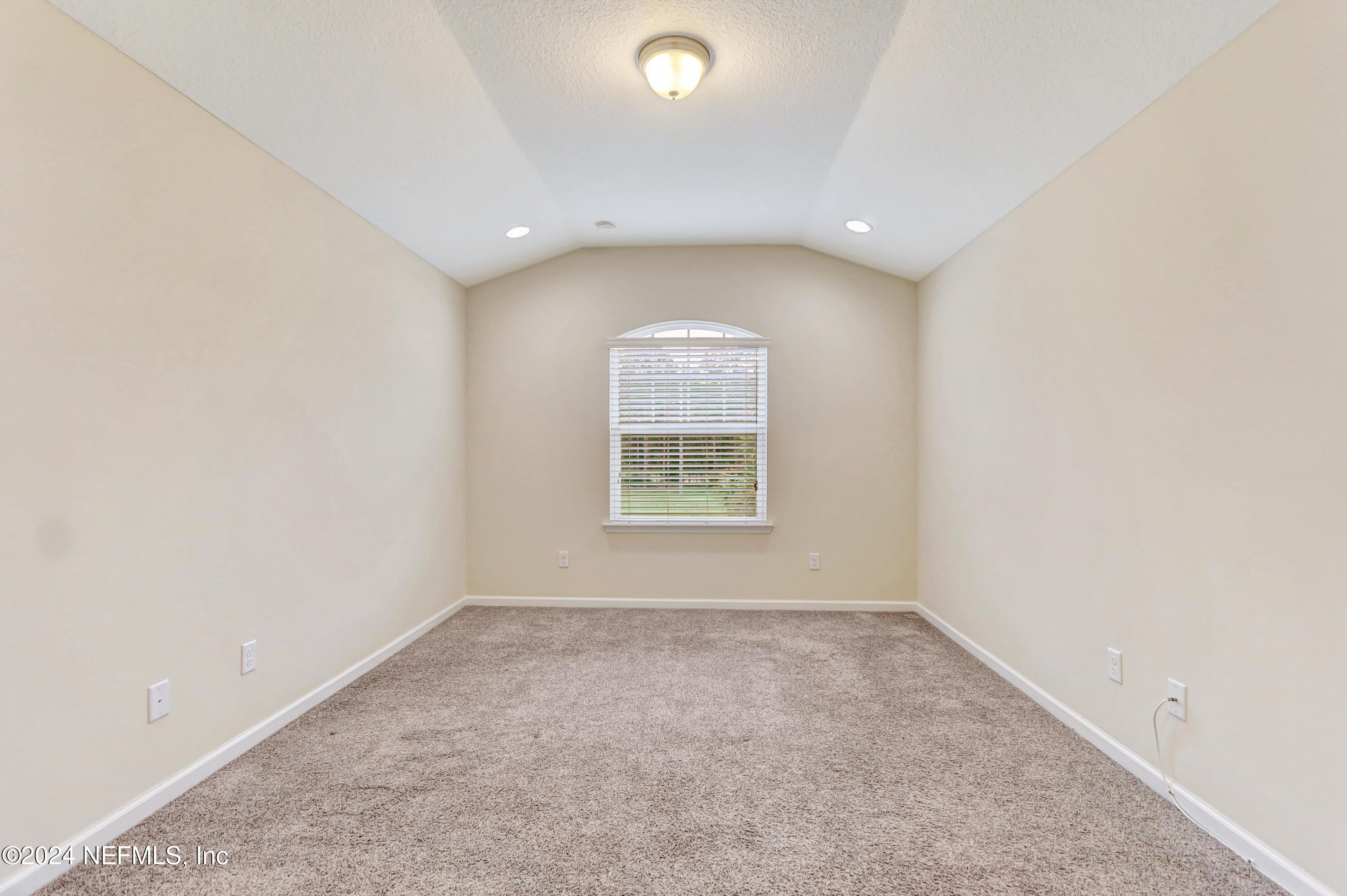 95 Nelson Lane St. Johns, FL 32259 - Photo 18 of 30 an empty room with a window