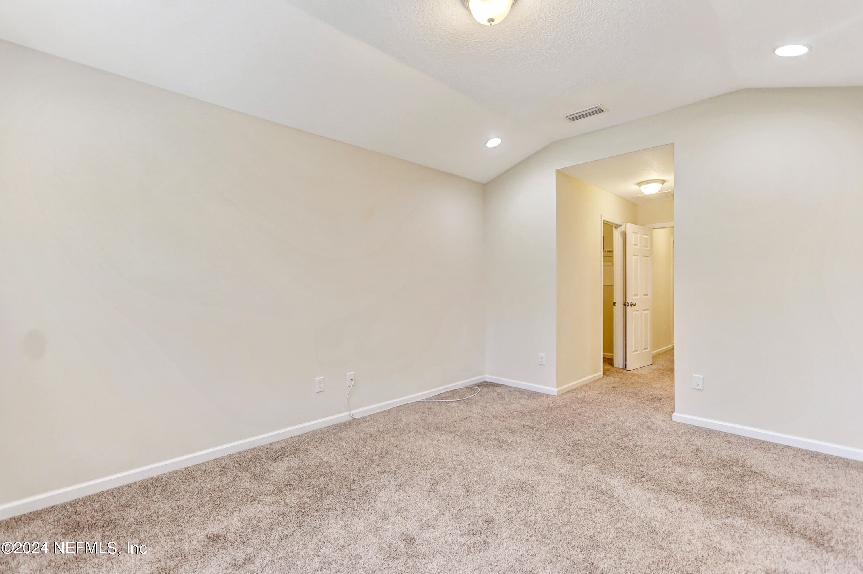 95 Nelson Lane St. Johns, FL 32259 - Photo 20 of 30 an empty room with an entryway and closet area