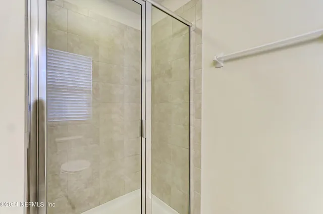 an empty room with a empty space and a window