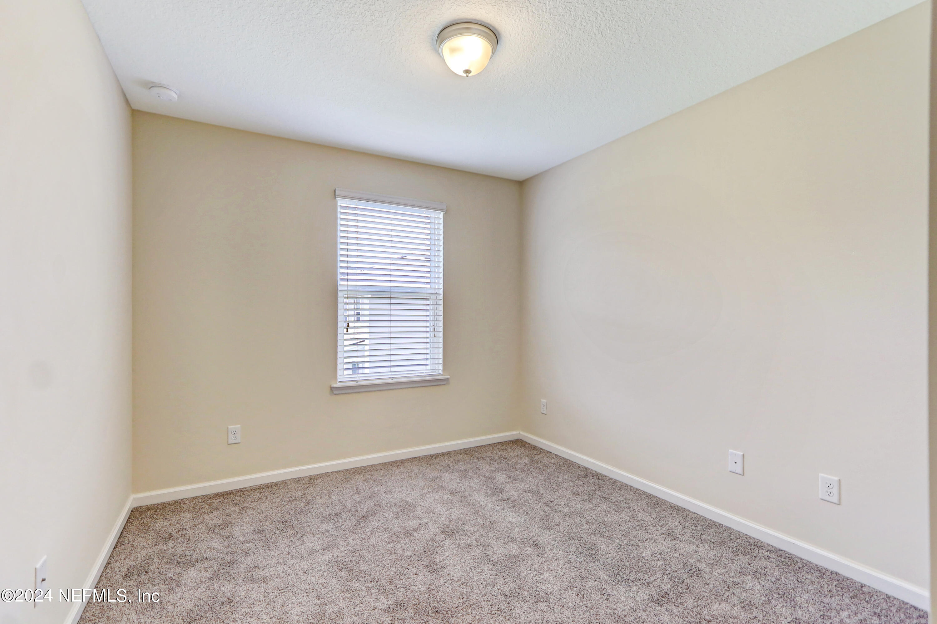 95 Nelson Lane St. Johns, FL 32259 - Photo 23 of 30 an empty room with a empty space and a window