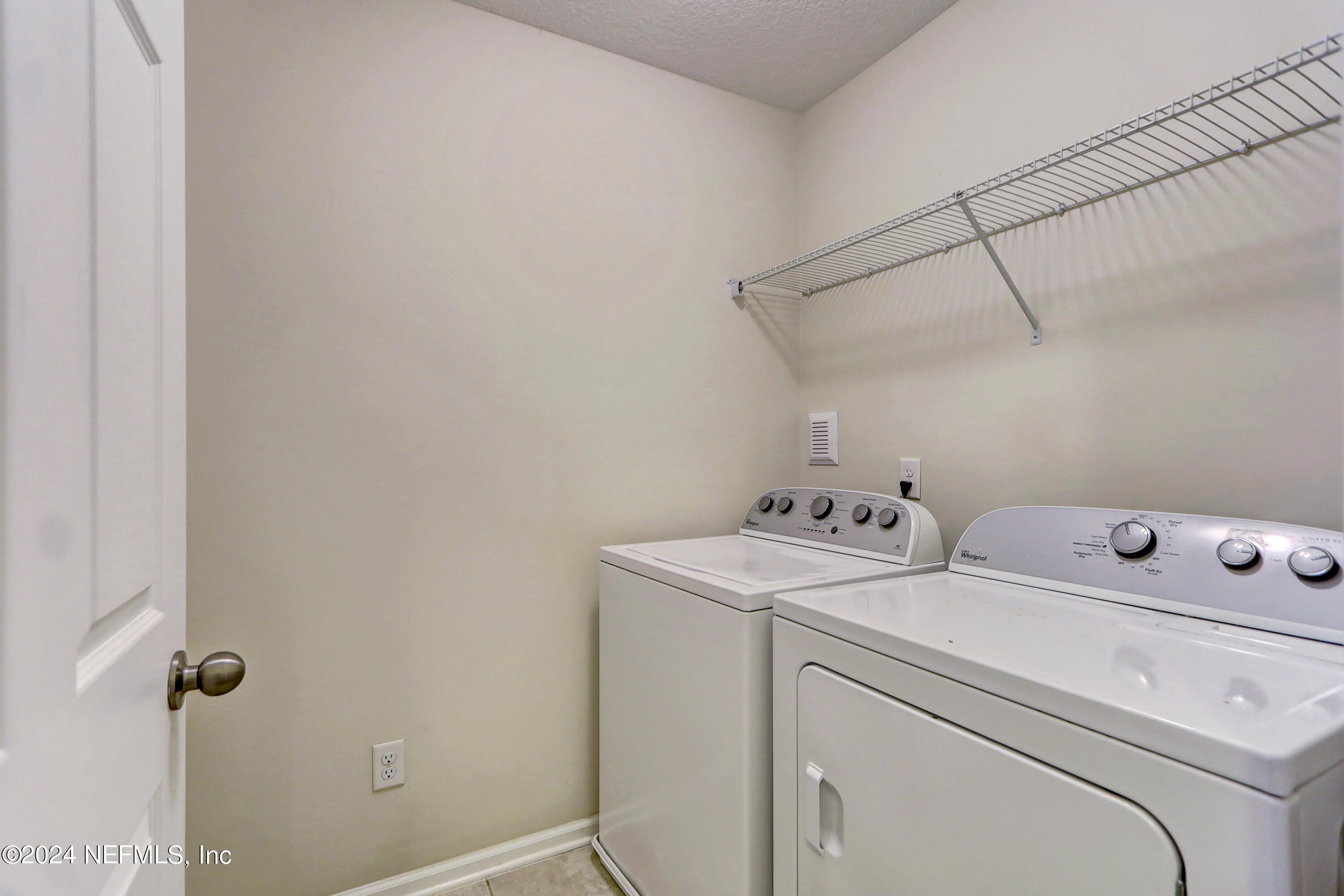 95 Nelson Lane St. Johns, FL 32259 - Photo 28 of 30 a utility room with dryer and washer