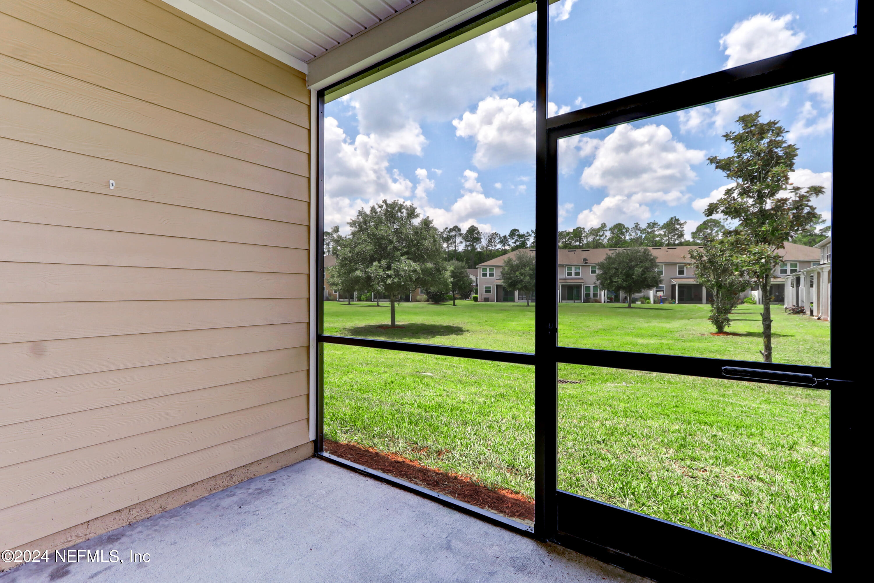 95 Nelson Lane St. Johns, FL 32259 - Photo 29 of 30 a view of a room with a large window and yard