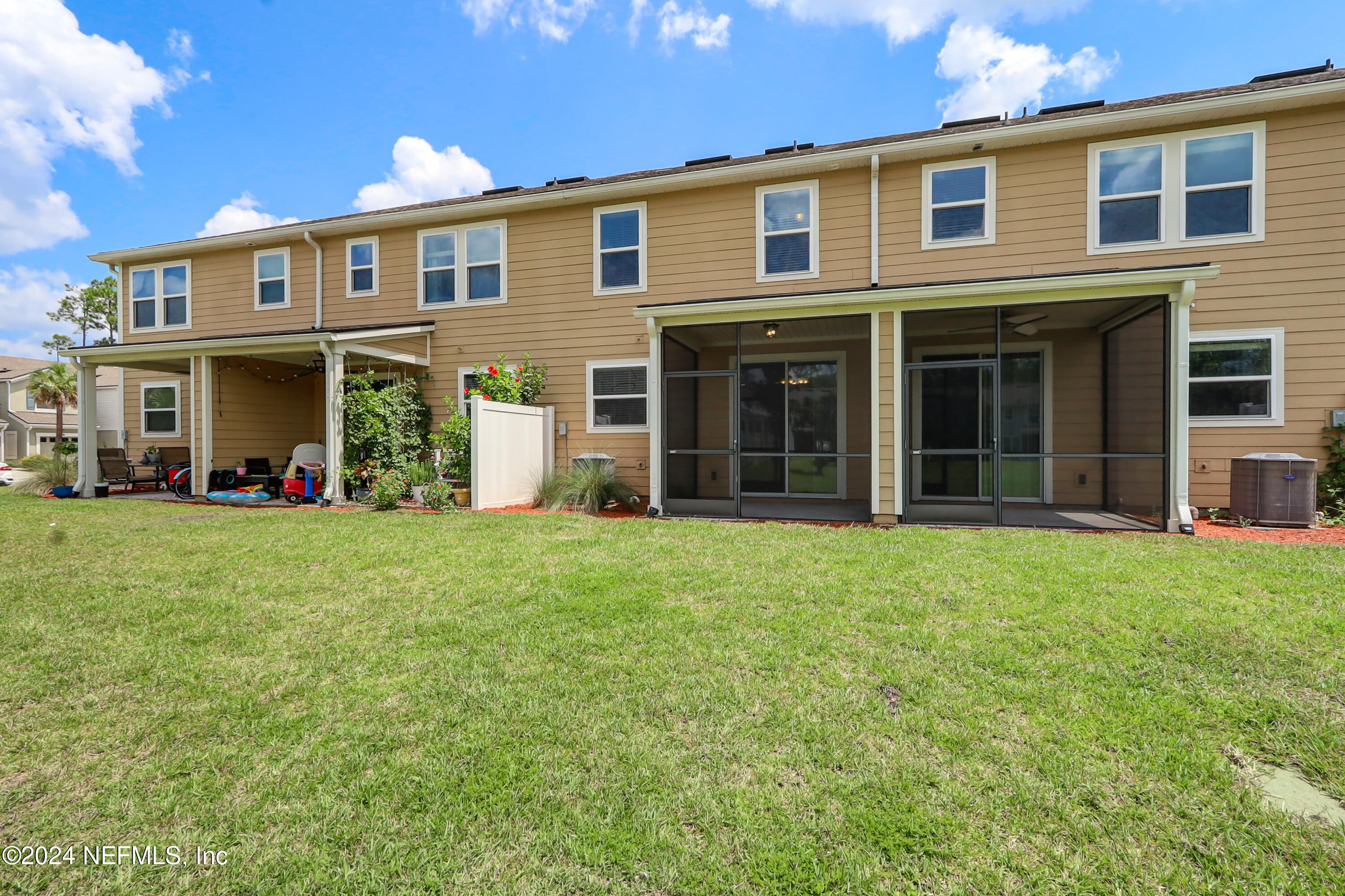 95 Nelson Lane St. Johns, FL 32259 - Photo 30 of 30 a front view of a house with a yard