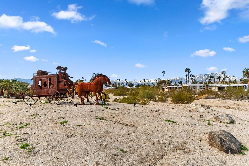 74711 Dillon Road, Unit 247 Desert Hot Springs, CA 92241 - Photo 31 of 33 a view of a lake with a beach