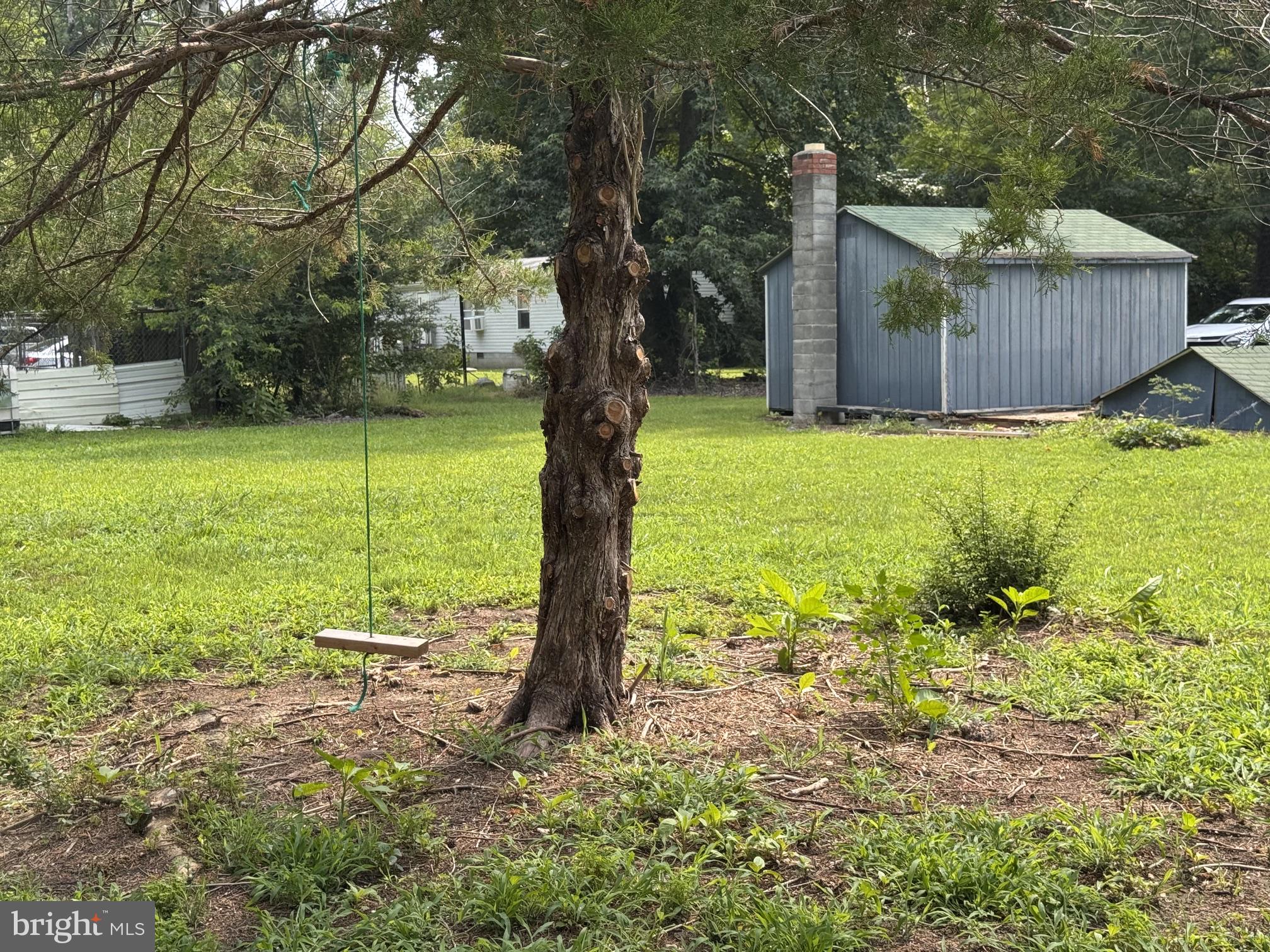 461 Long Point Road Hague, VA 22469 - Photo 6 of 25 Charming backyard retreat with swing.