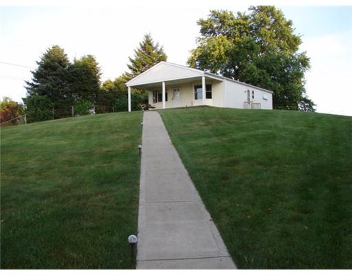 29 1/2 Flora Road Baldwin, PA 15227 - Photo 16 of 18 Exterior Front. Sidewalk from 29 Flora leads up to 29 1/2 Flora