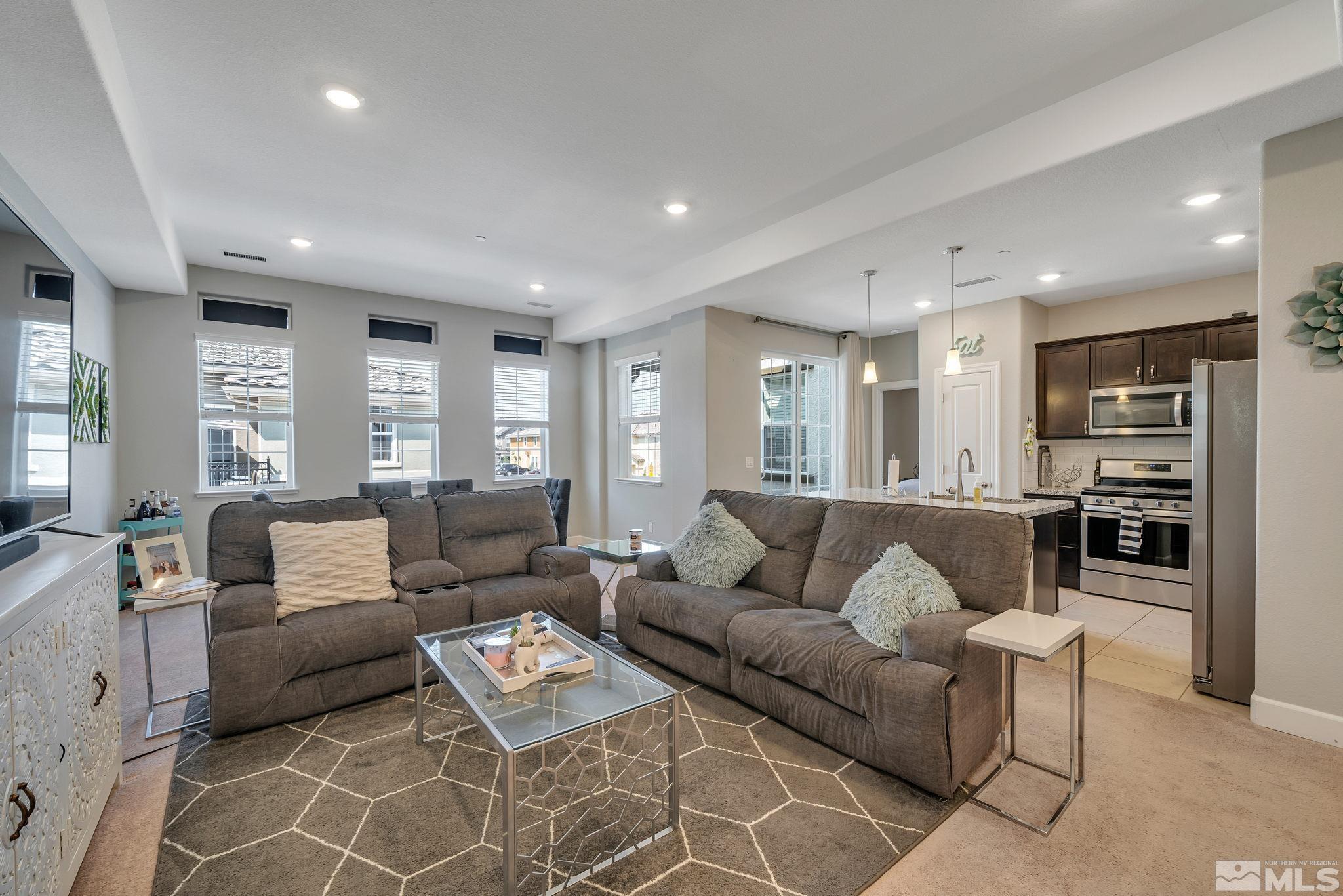 1914 Sea Horse Road, Unit A Reno, NV 89521 - Photo 2 of 28 a living room with furniture and a table