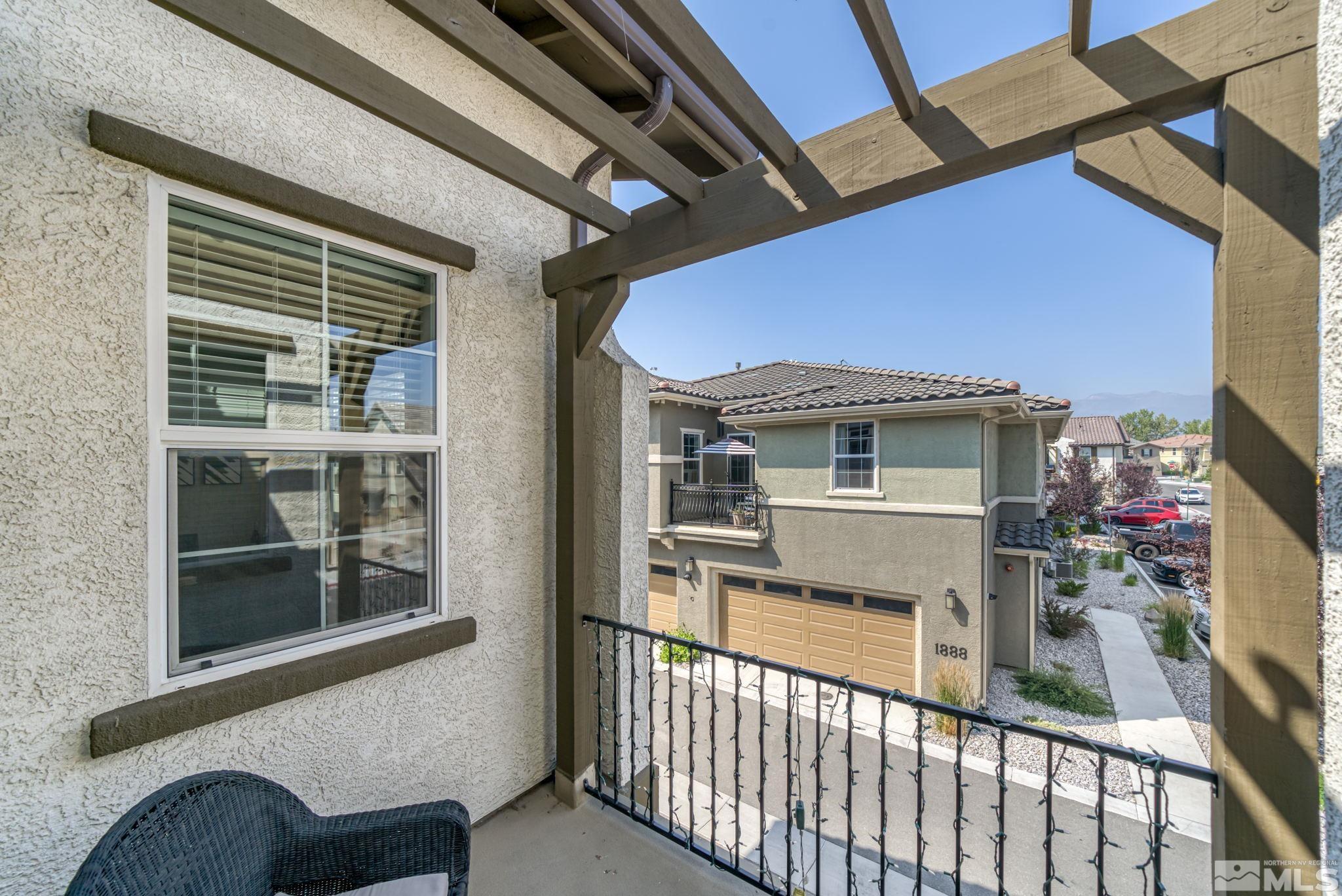 1914 Sea Horse Road, Unit A Reno, NV 89521 - Photo 25 of 28 a view of a house with a porch