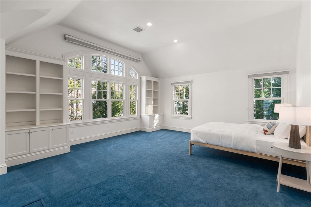 182 Winding River Road Wellesley, MA 02482 - Photo 28 of 40 a bed room with a bed and a large window