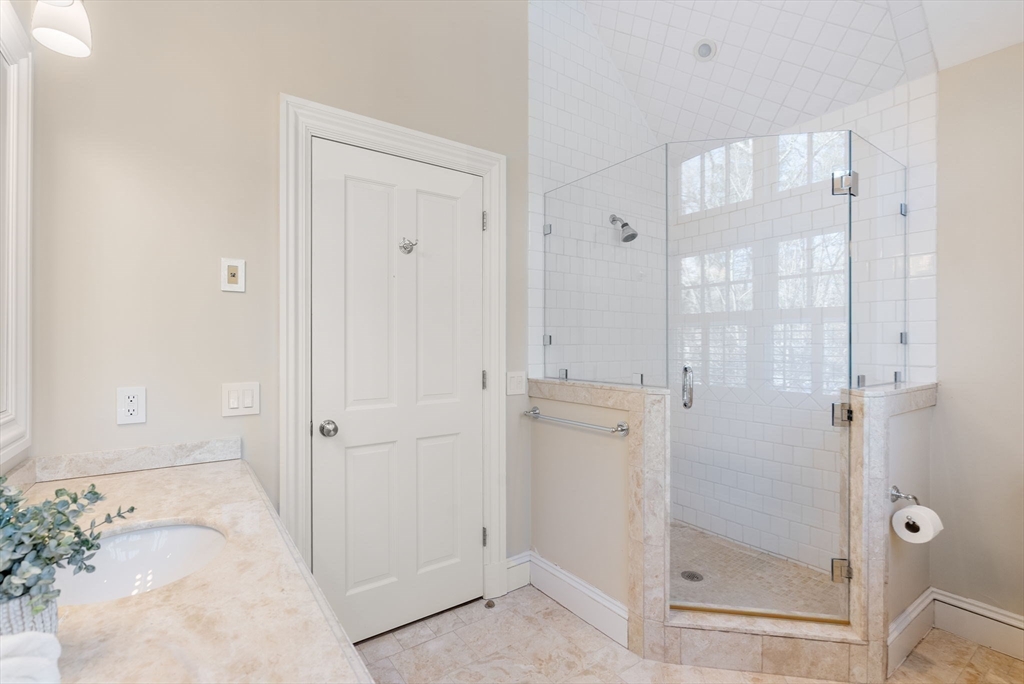 182 Winding River Road Wellesley, MA 02482 - Photo 32 of 40 a bathroom with a shower