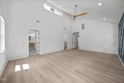a bathroom with a sink a mirror and a bathtub