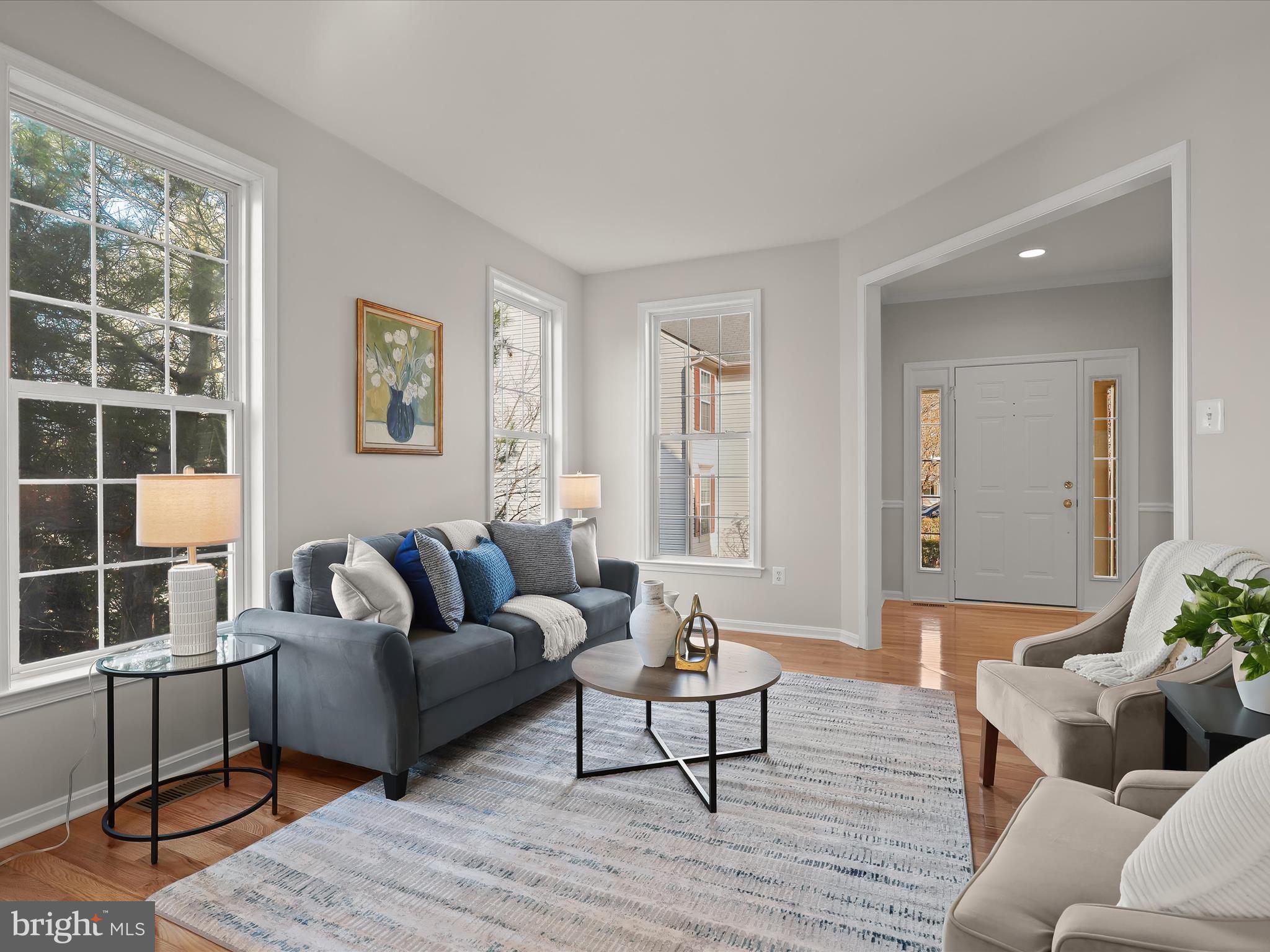 6413 Phantom Moon Walk Clarksville, MD 21029 - Photo 10 of 60 a living room with furniture and a window