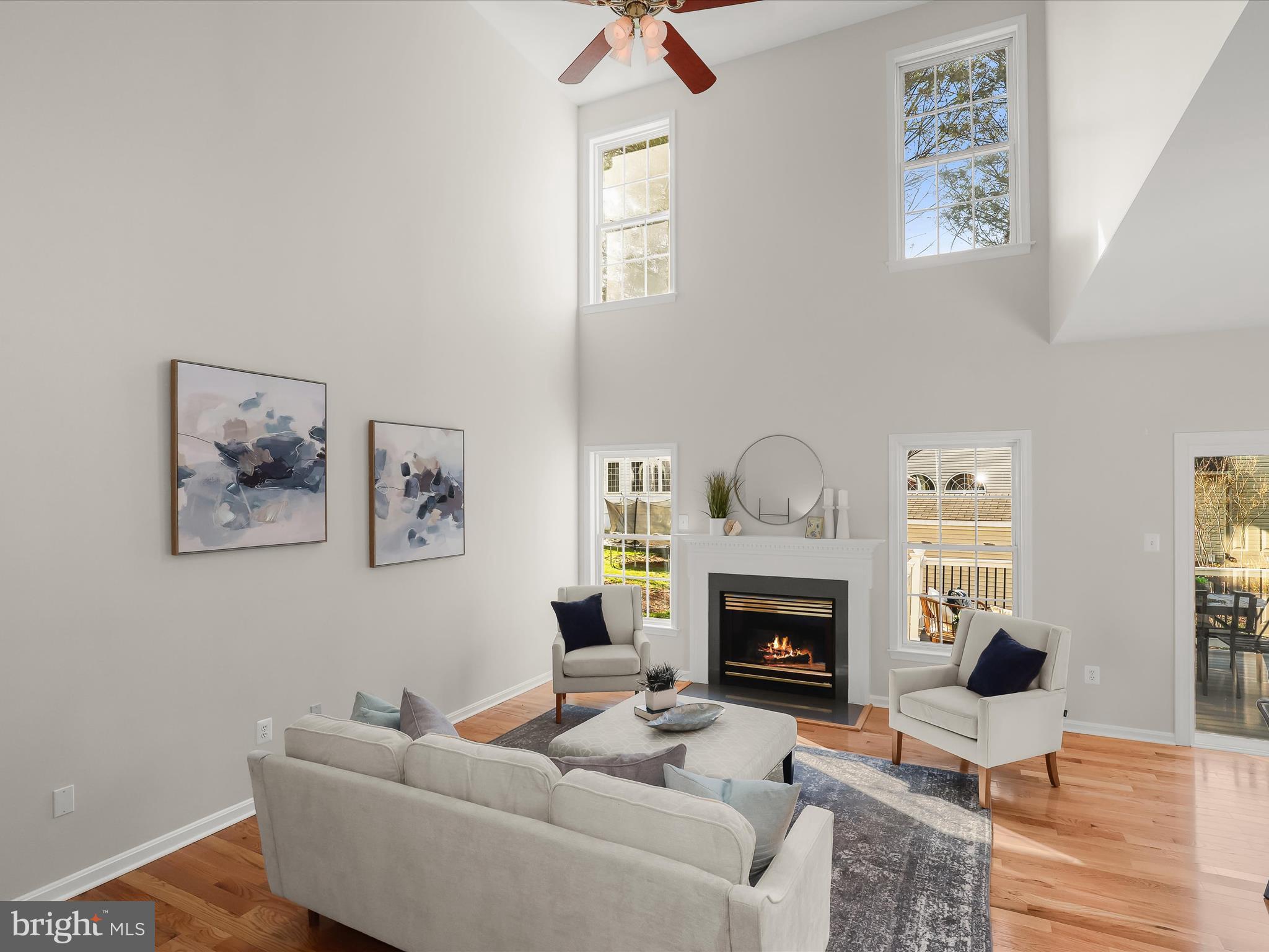 6413 Phantom Moon Walk Clarksville, MD 21029 - Photo 21 of 60 a living room with furniture and a fireplace