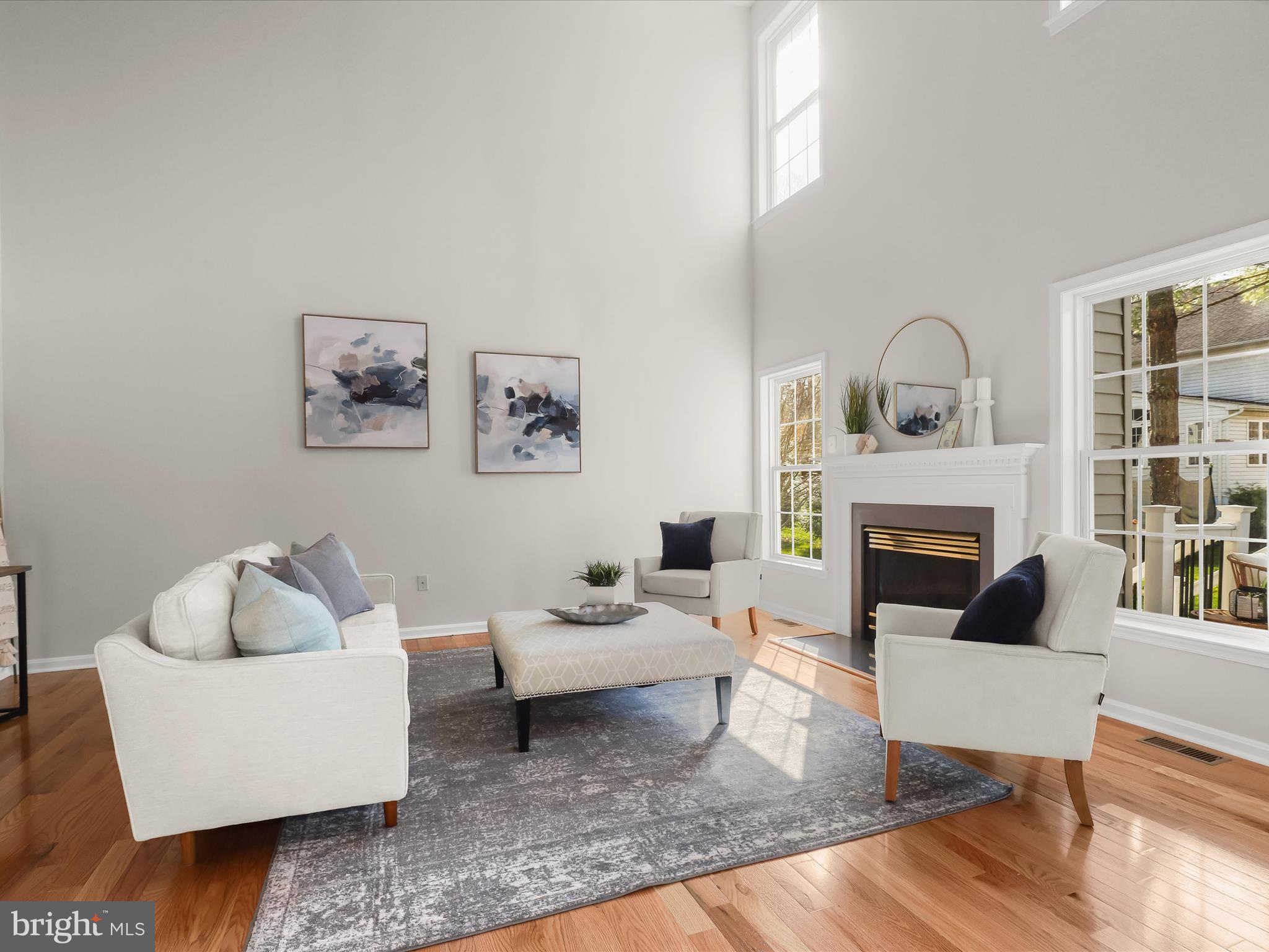 6413 Phantom Moon Walk Clarksville, MD 21029 - Photo 23 of 60 a living room with furniture and a fireplace