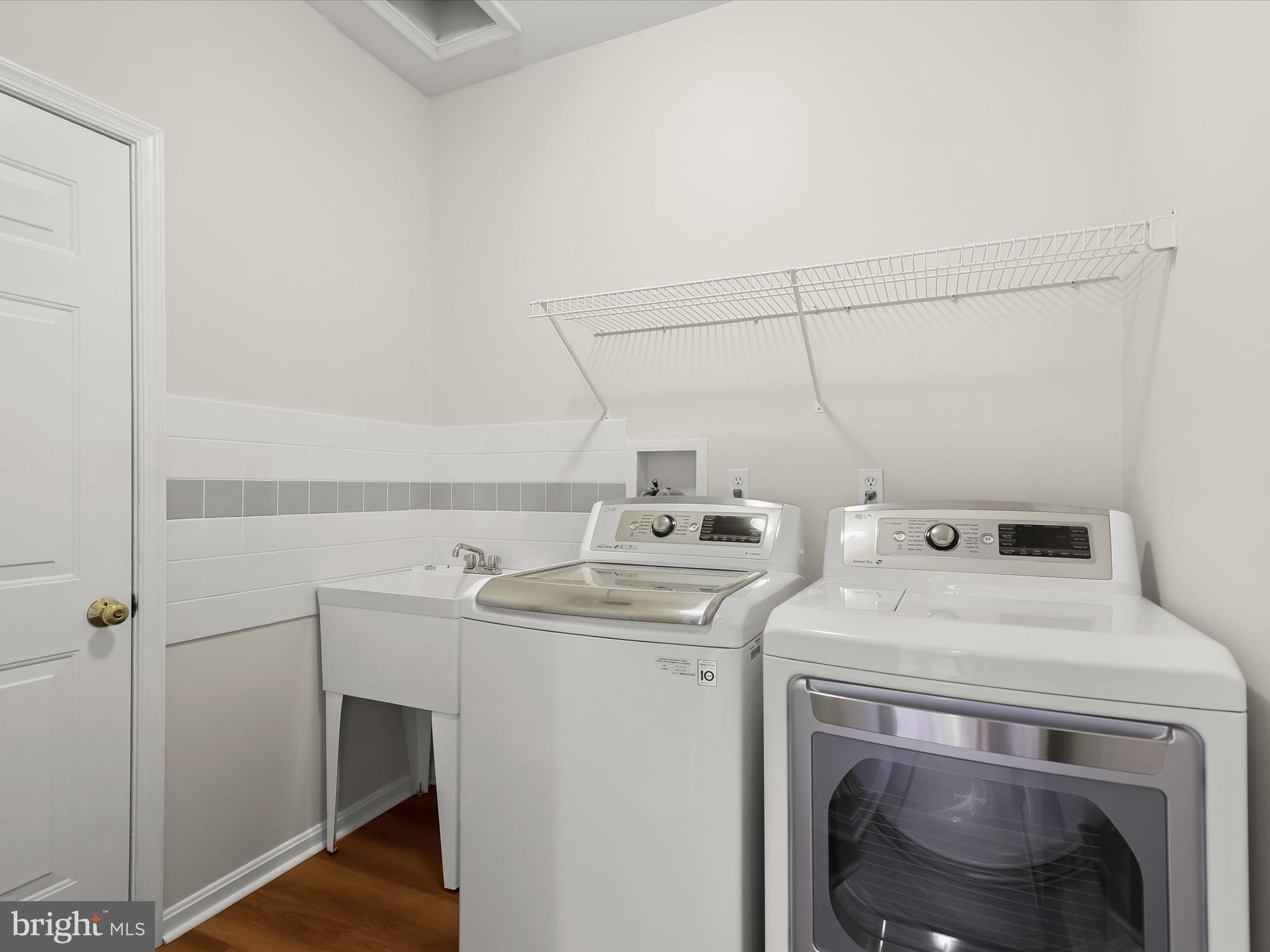 6413 Phantom Moon Walk Clarksville, MD 21029 - Photo 27 of 60 a utility room with dryer and washer