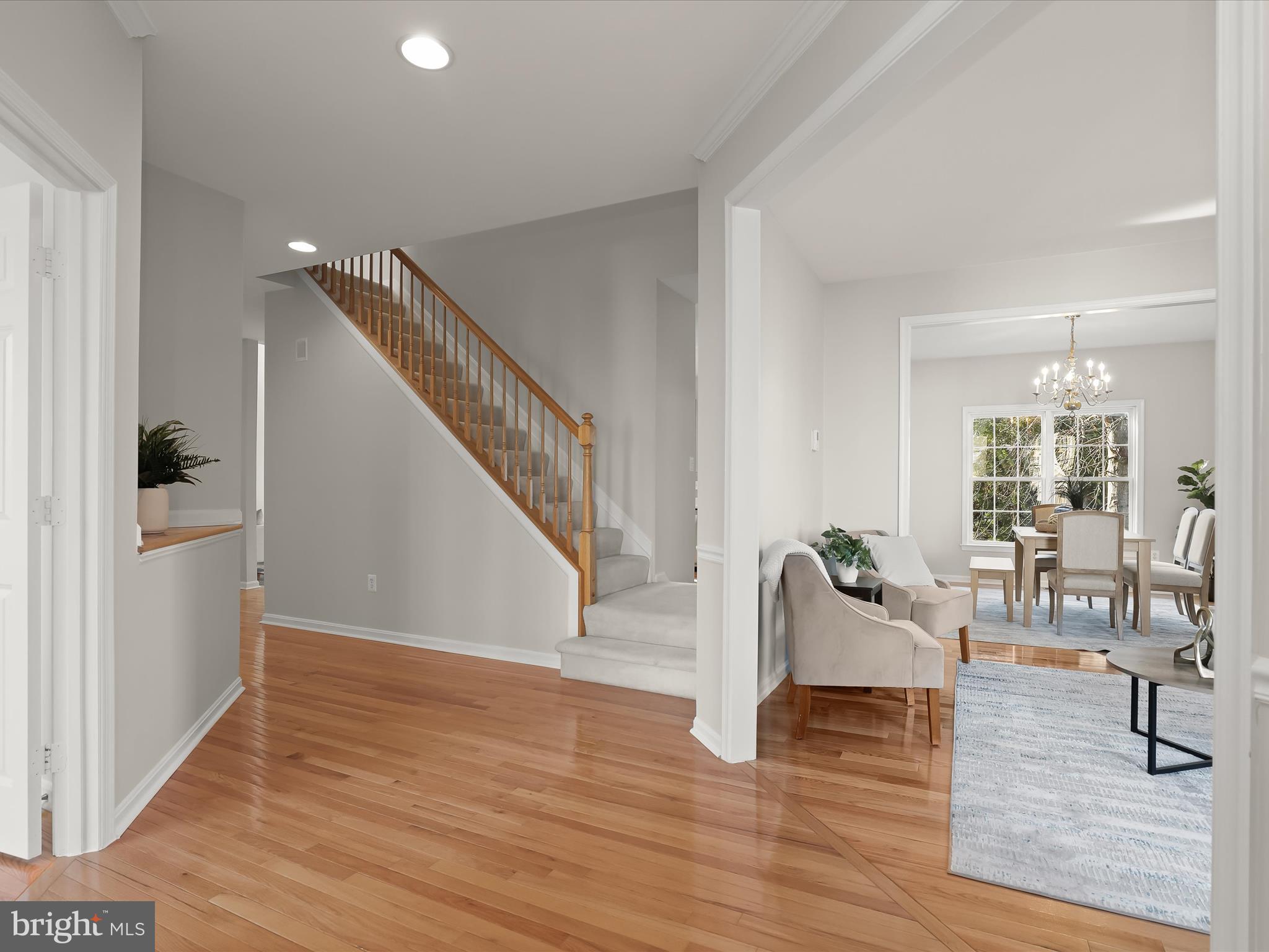 6413 Phantom Moon Walk Clarksville, MD 21029 - Photo 28 of 60 a living room with furniture and wooden floor