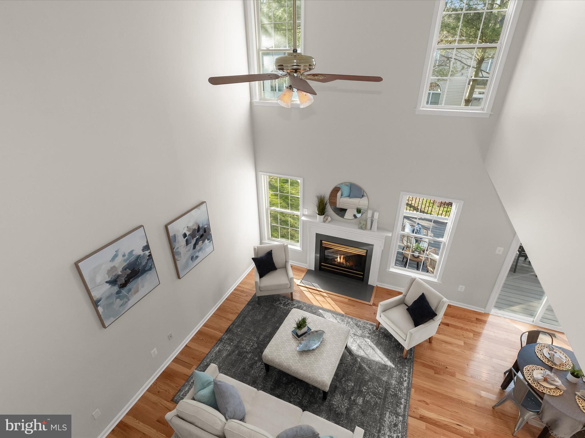 6413 Phantom Moon Walk Clarksville, MD 21029 - Photo 29 of 60 a living room with furniture and a fireplace