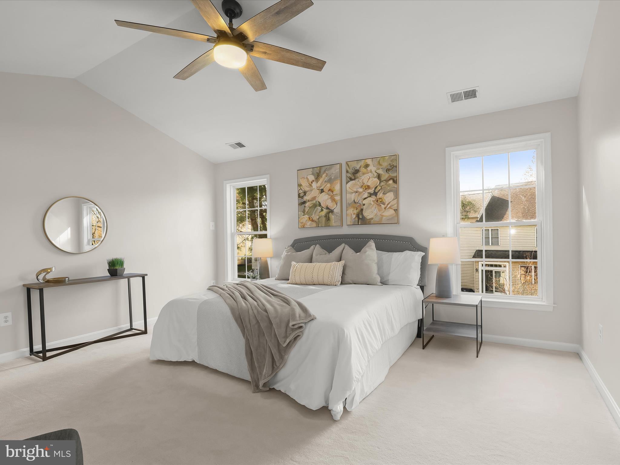 6413 Phantom Moon Walk Clarksville, MD 21029 - Photo 31 of 60 a bedroom with a bed lamps and window