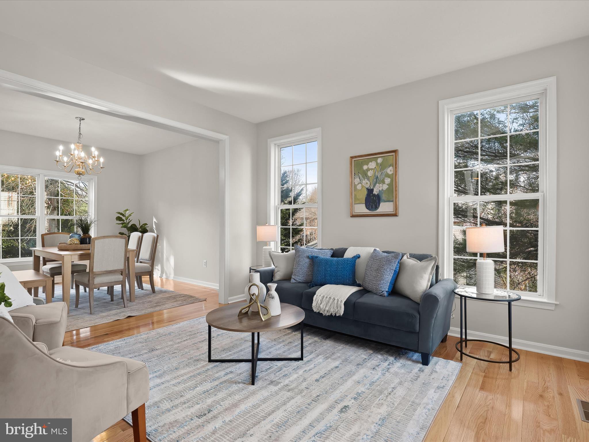6413 Phantom Moon Walk Clarksville, MD 21029 - Photo 3 of 60 a living room with furniture and wooden floor