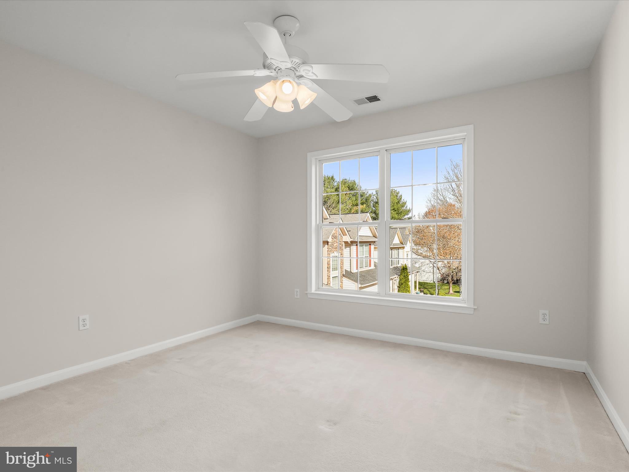 6413 Phantom Moon Walk Clarksville, MD 21029 - Photo 40 of 60 an empty room with a window