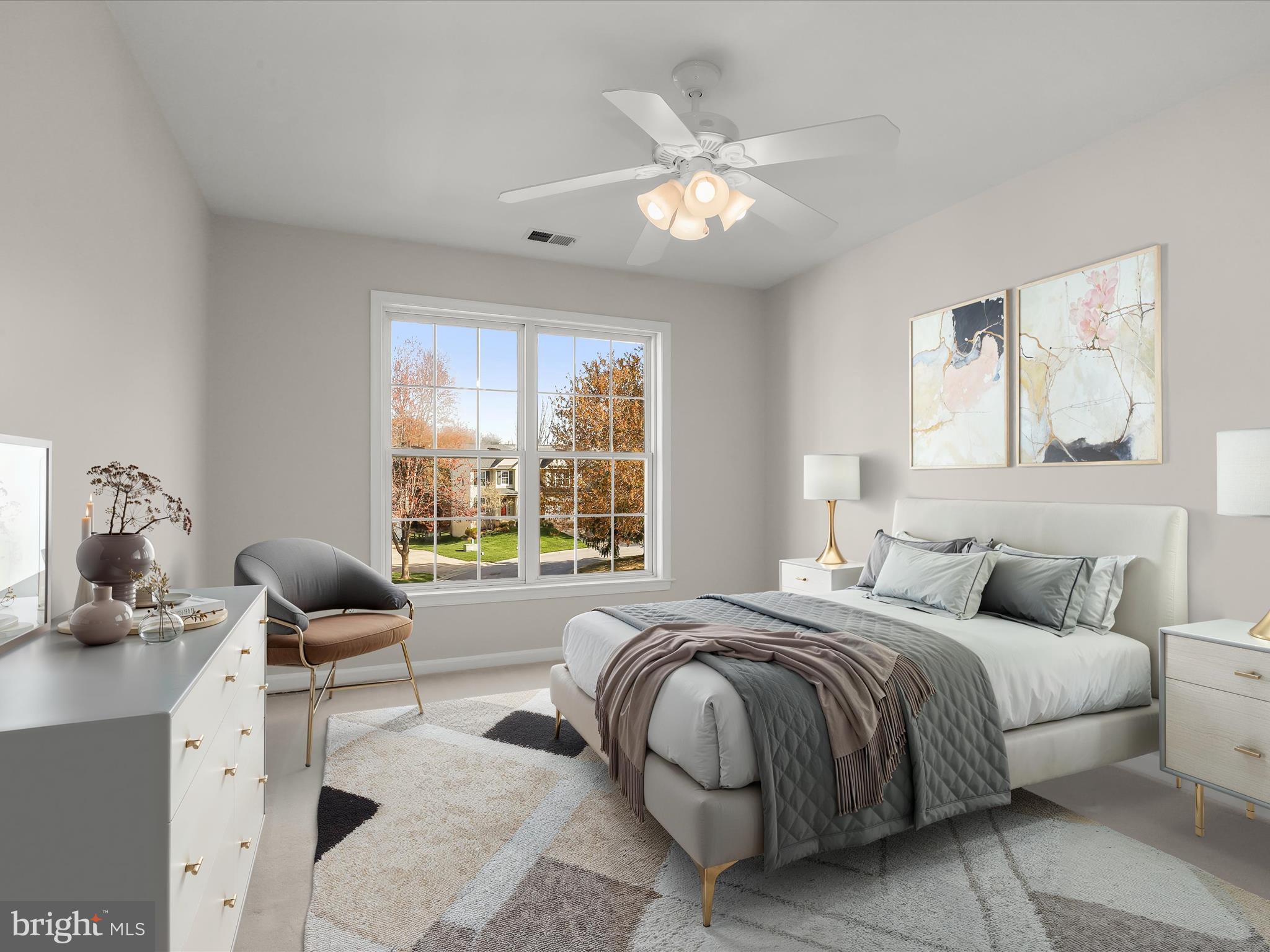 6413 Phantom Moon Walk Clarksville, MD 21029 - Photo 41 of 60 a bedroom with a bed and large windows