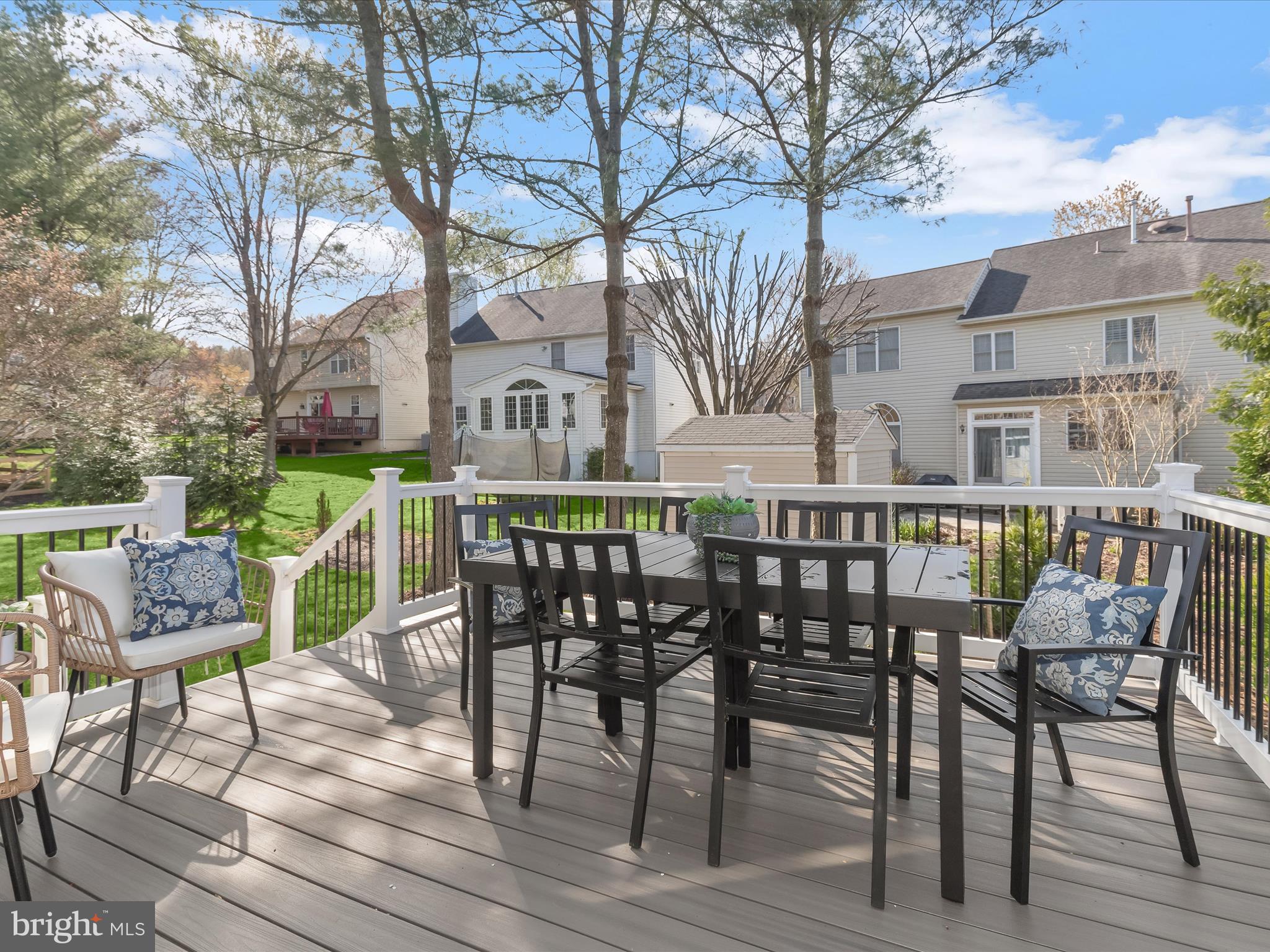 6413 Phantom Moon Walk Clarksville, MD 21029 - Photo 50 of 60 a view of a chairs and table on the wooden floor