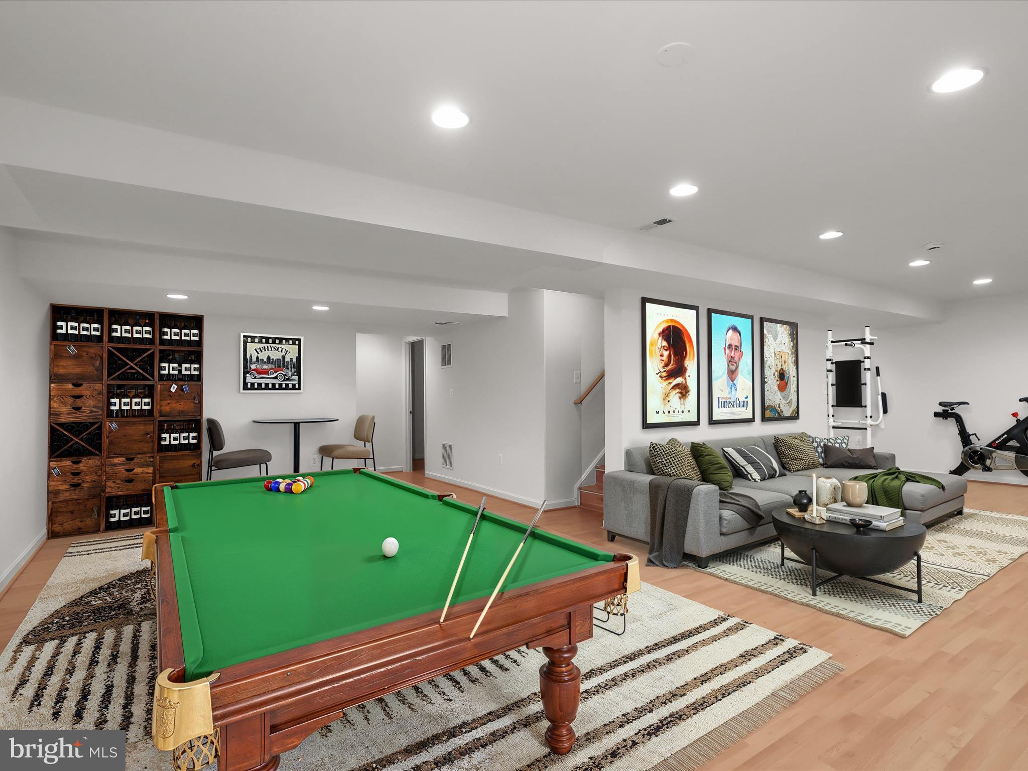 6413 Phantom Moon Walk Clarksville, MD 21029 - Photo 5 of 60 a living room with furniture and a flat screen tv