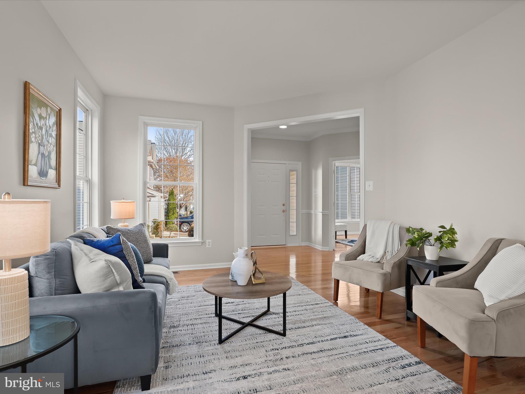 6413 Phantom Moon Walk Clarksville, MD 21029 - Photo 6 of 60 a living room with furniture and a large window